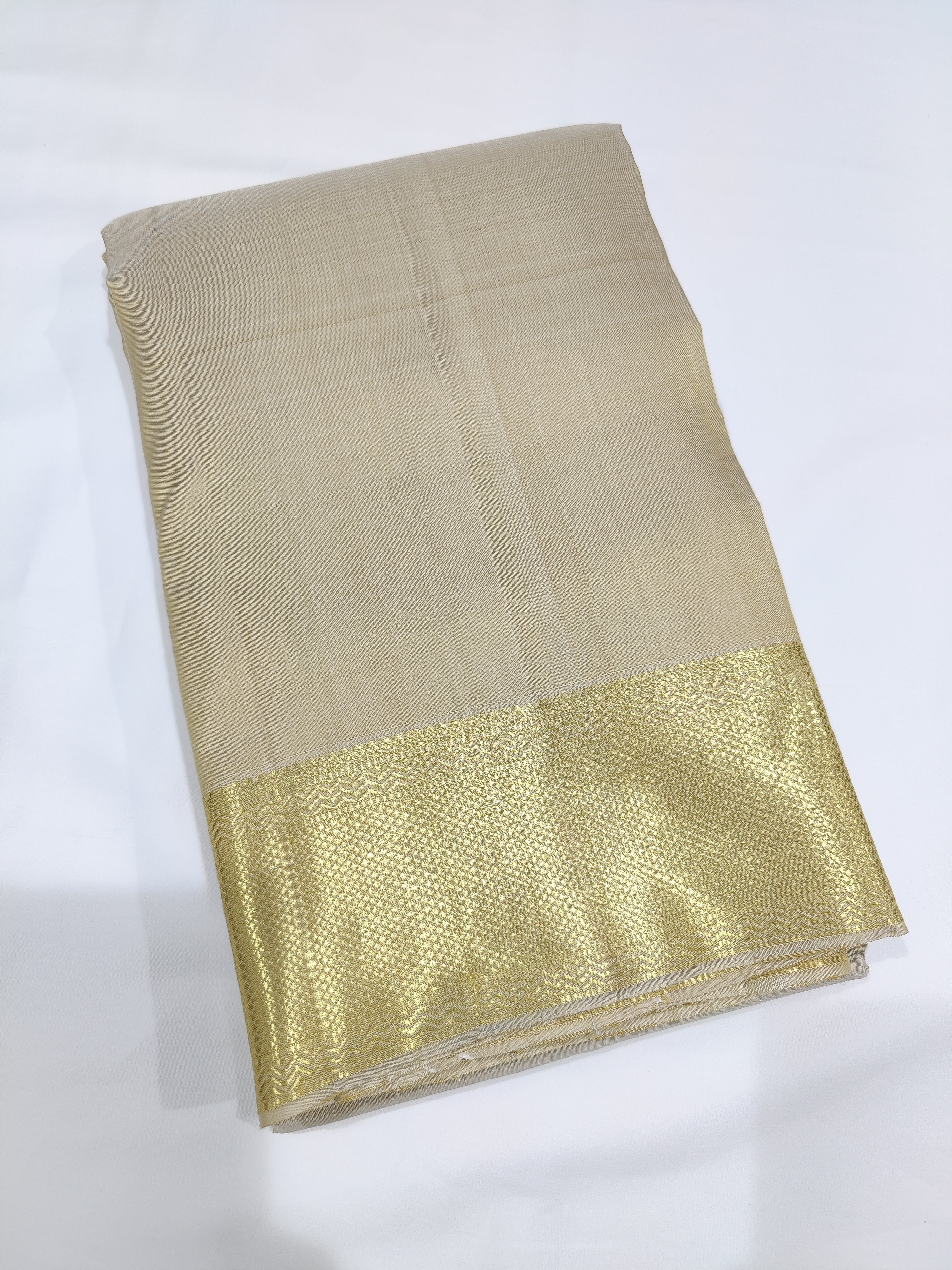 "Cream Kanjivaram Silk Dhoti with Gold Zari Border – Wedding Collection for Men" - New Sudarshan Silks`