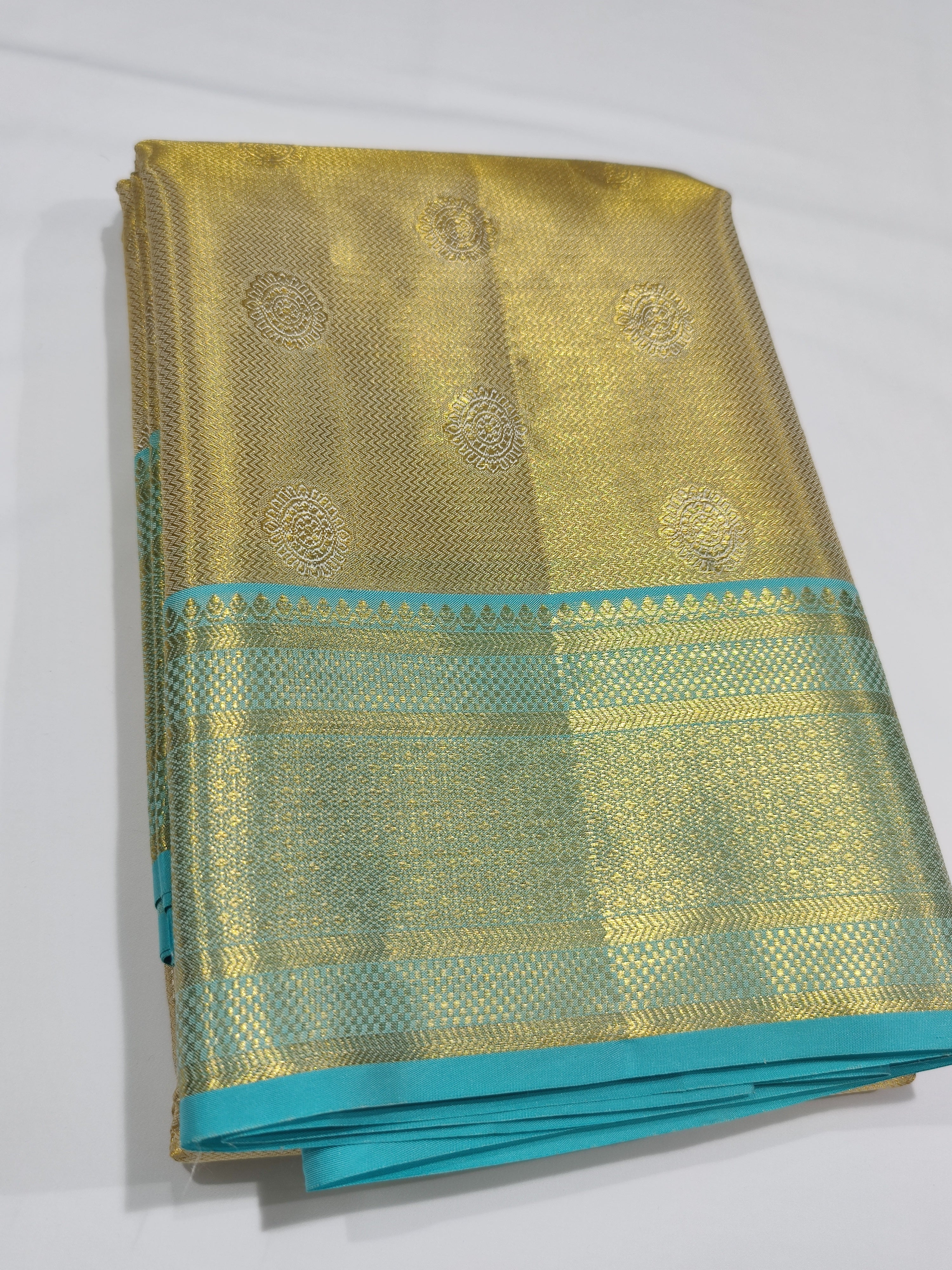"Pure Gold Tissue Silk Dhoti with Light Blue & Gold Zari Work Border + Shirt Piece – Wedding Collection" - New Sudarshan Silks`