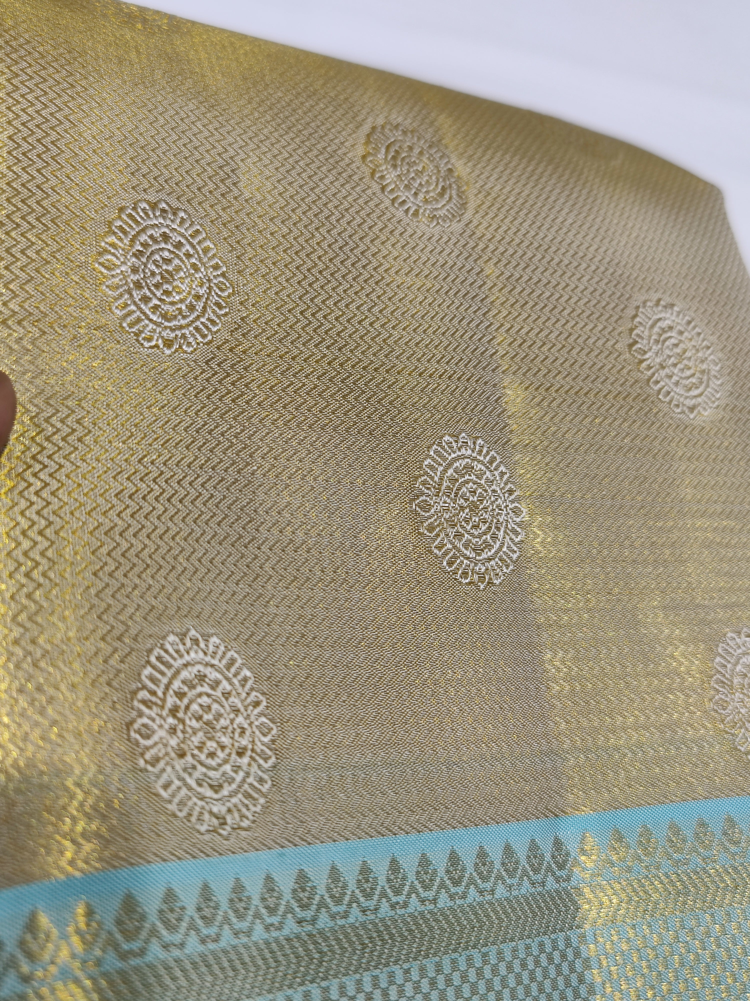 "Pure Gold Tissue Silk Dhoti with Light Blue & Gold Zari Work Border + Shirt Piece – Wedding Collection" - New Sudarshan Silks`