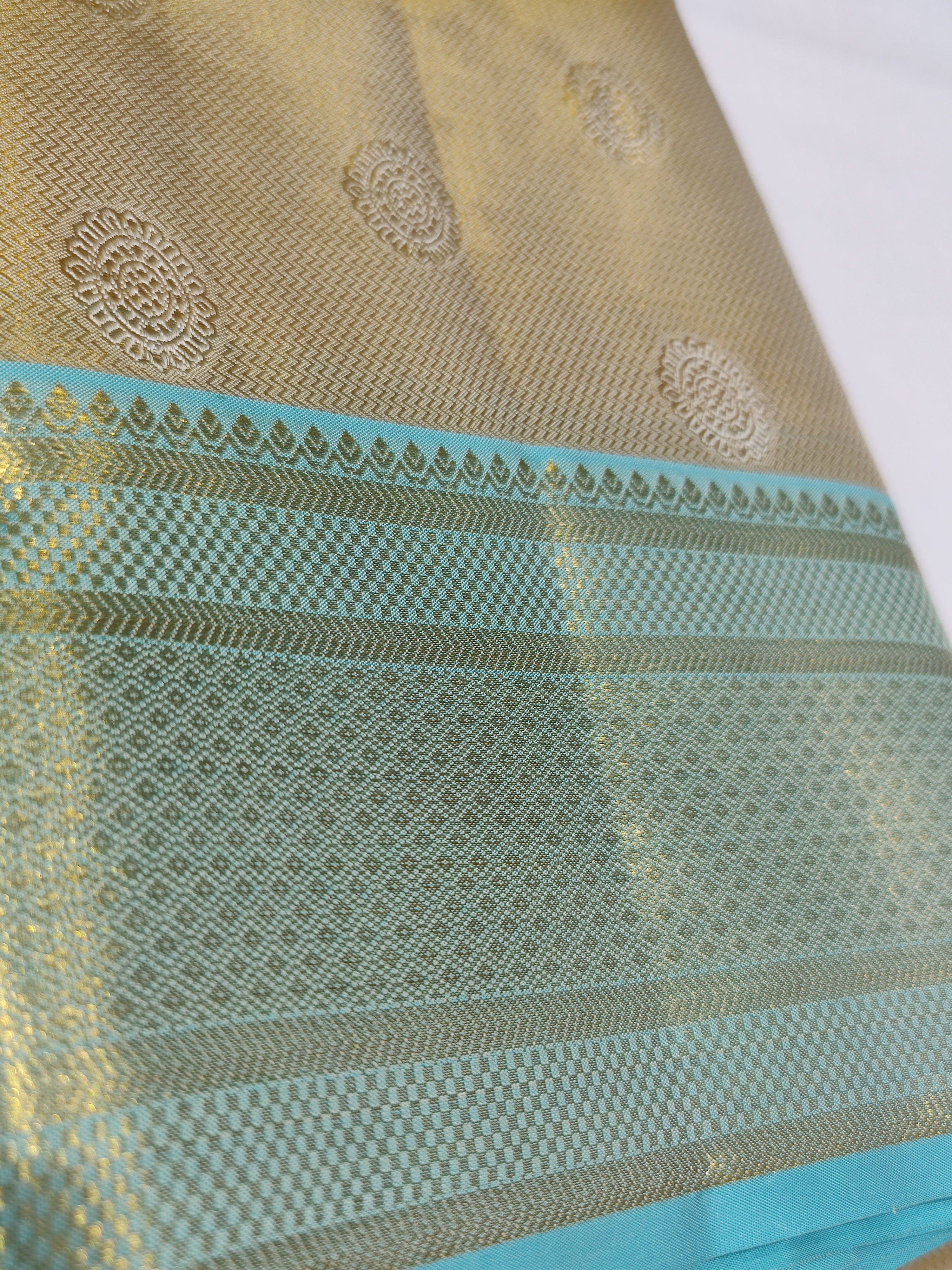 "Pure Gold Tissue Silk Dhoti with Light Blue & Gold Zari Work Border + Shirt Piece – Wedding Collection" - New Sudarshan Silks`