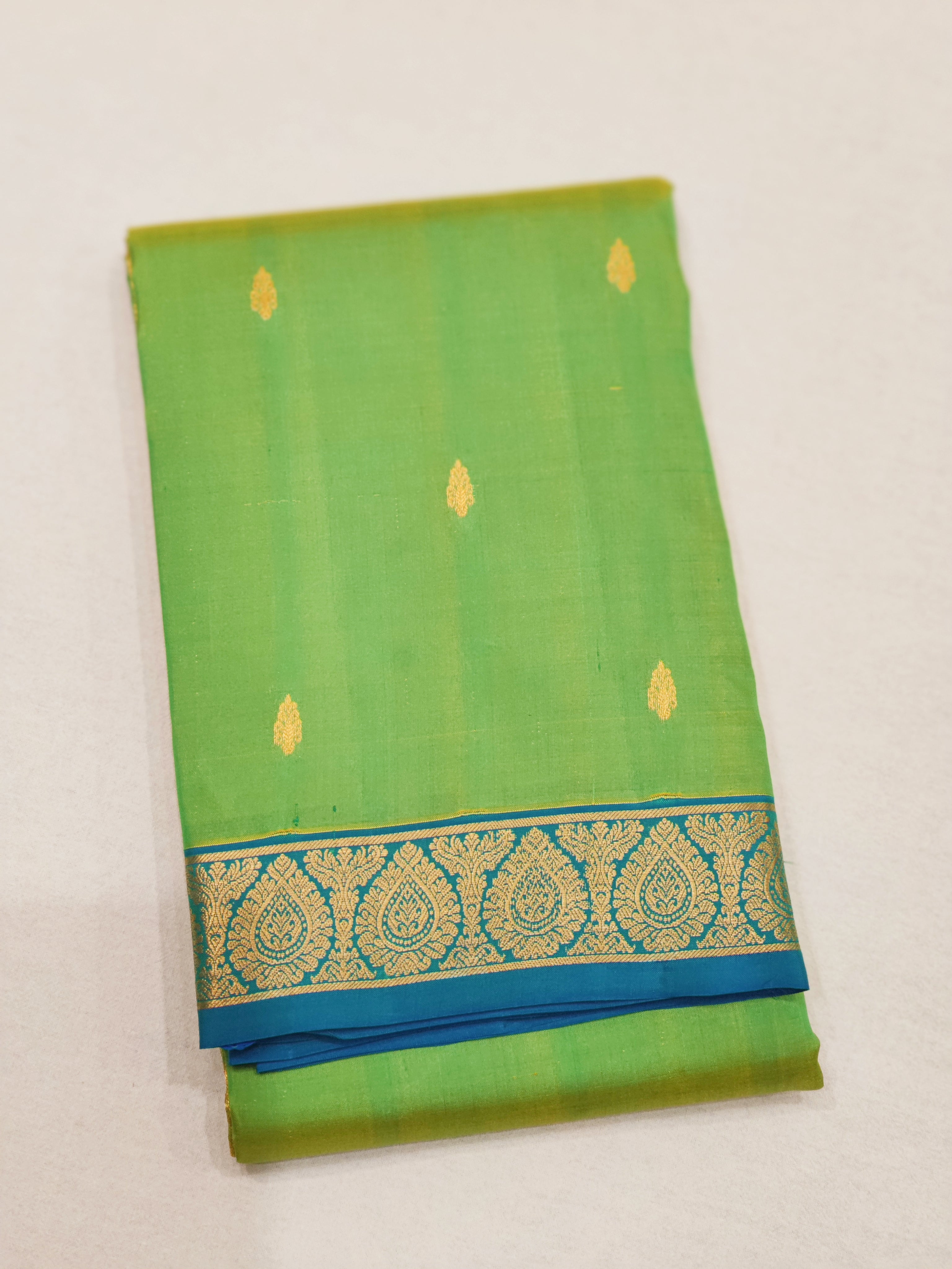Green Kanjivaram Silk Saree with Blue Border - Elegant New Arrival - New Sudarshan Silks`