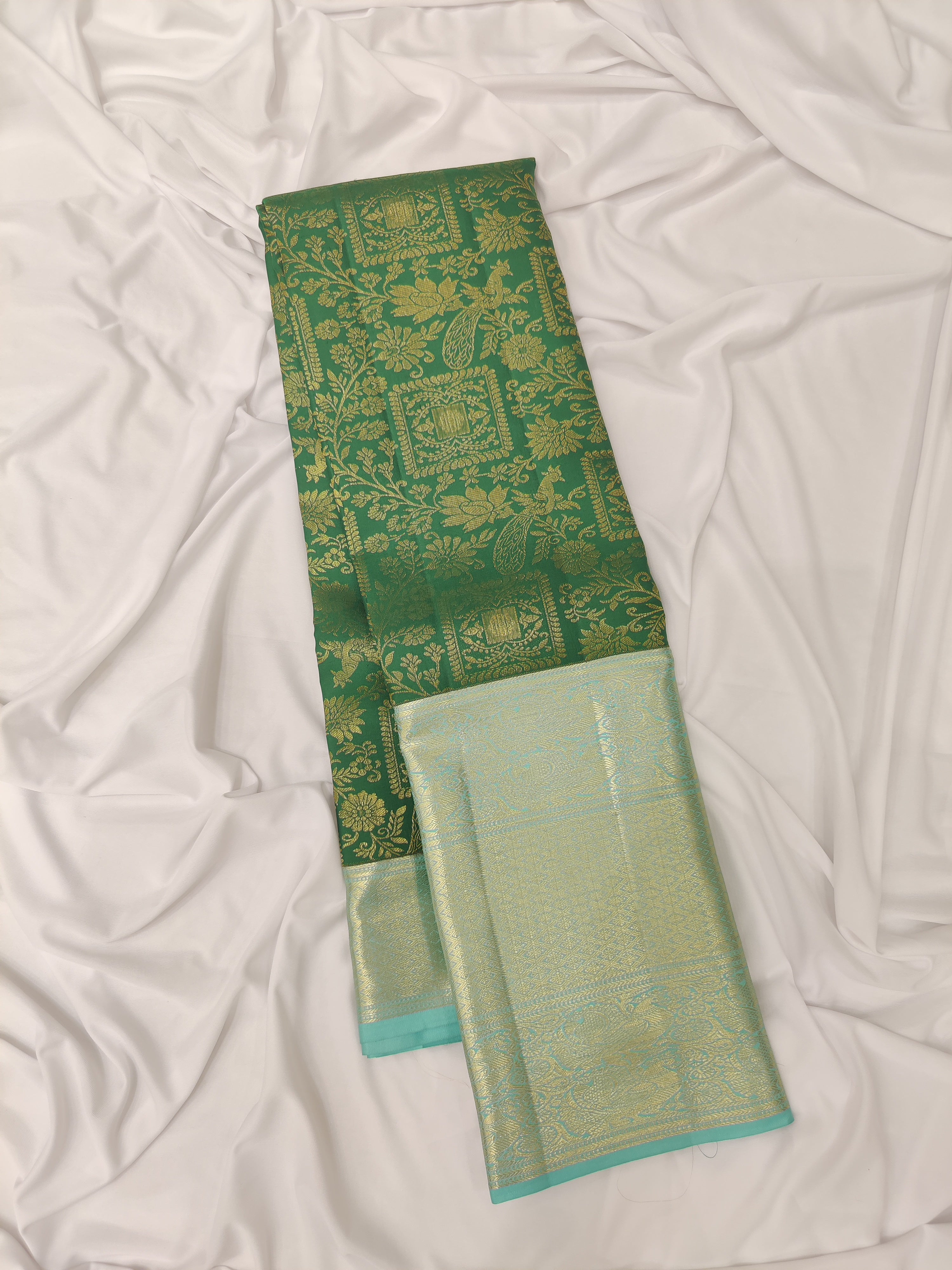 Bottle Green Brocade Kanjivaram Silk Saree with Sky Blue Zari Border – Pure Handloom Silk Saree Online - New Sudarshan Silks`