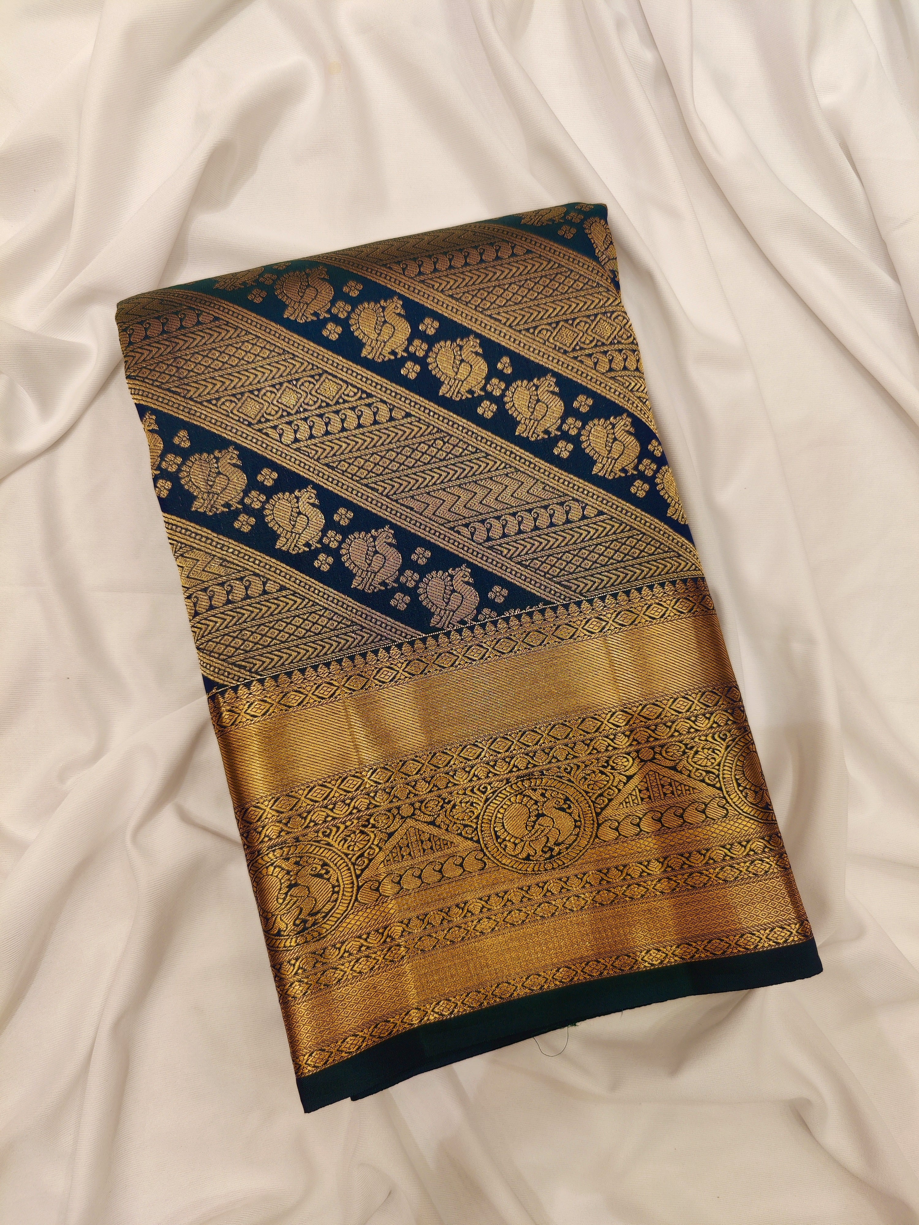 Peacock Green Kanjivaram Silk Saree with Self Zari Border – Pure Handloom Bridal Saree Online - New Sudarshan Silks`