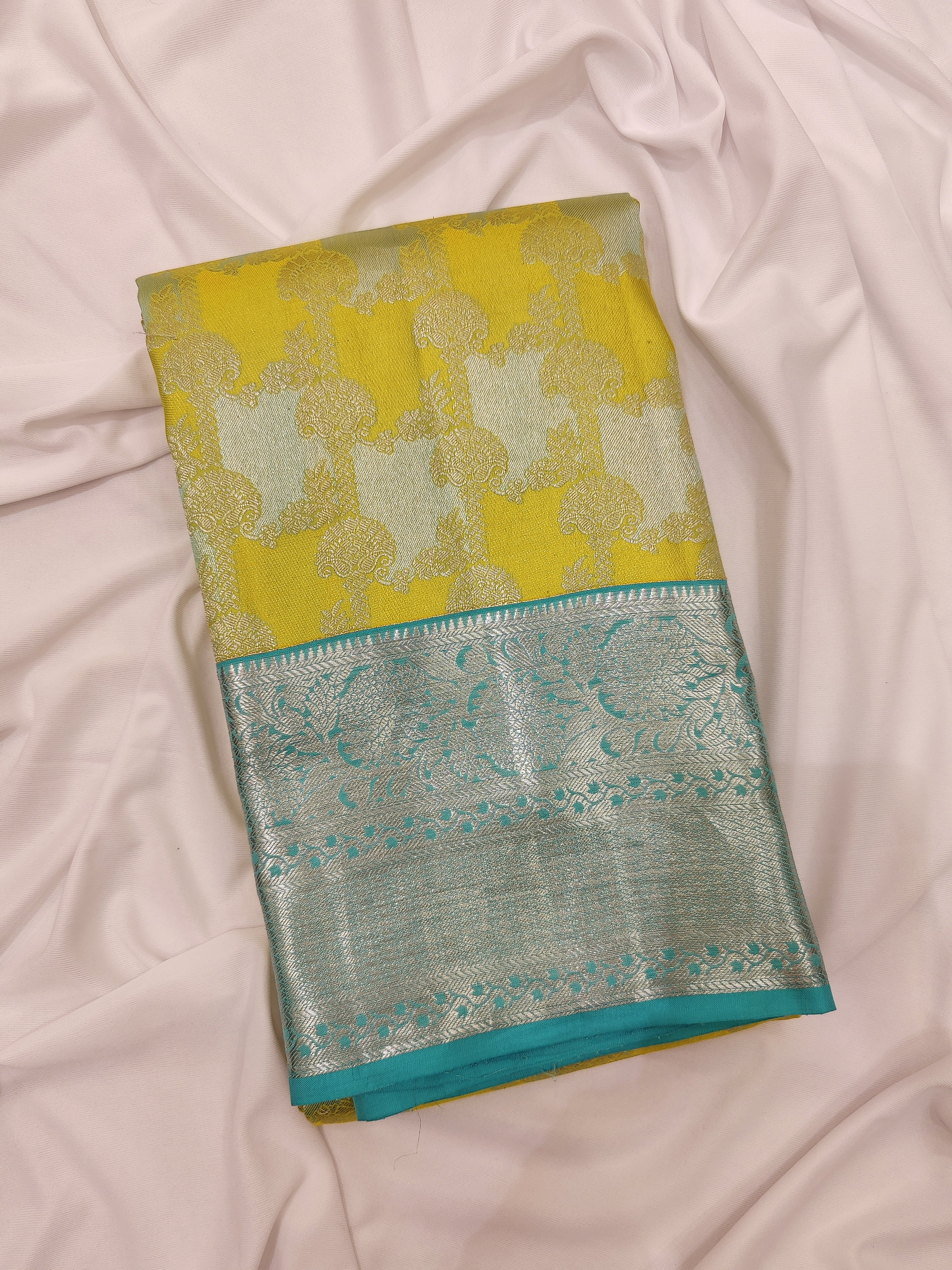 Lemon Yellow Kanjivaram Silk Saree with Blue Shade Zari Border – Pure Handloom Bridal Saree Online - New Sudarshan Silks`