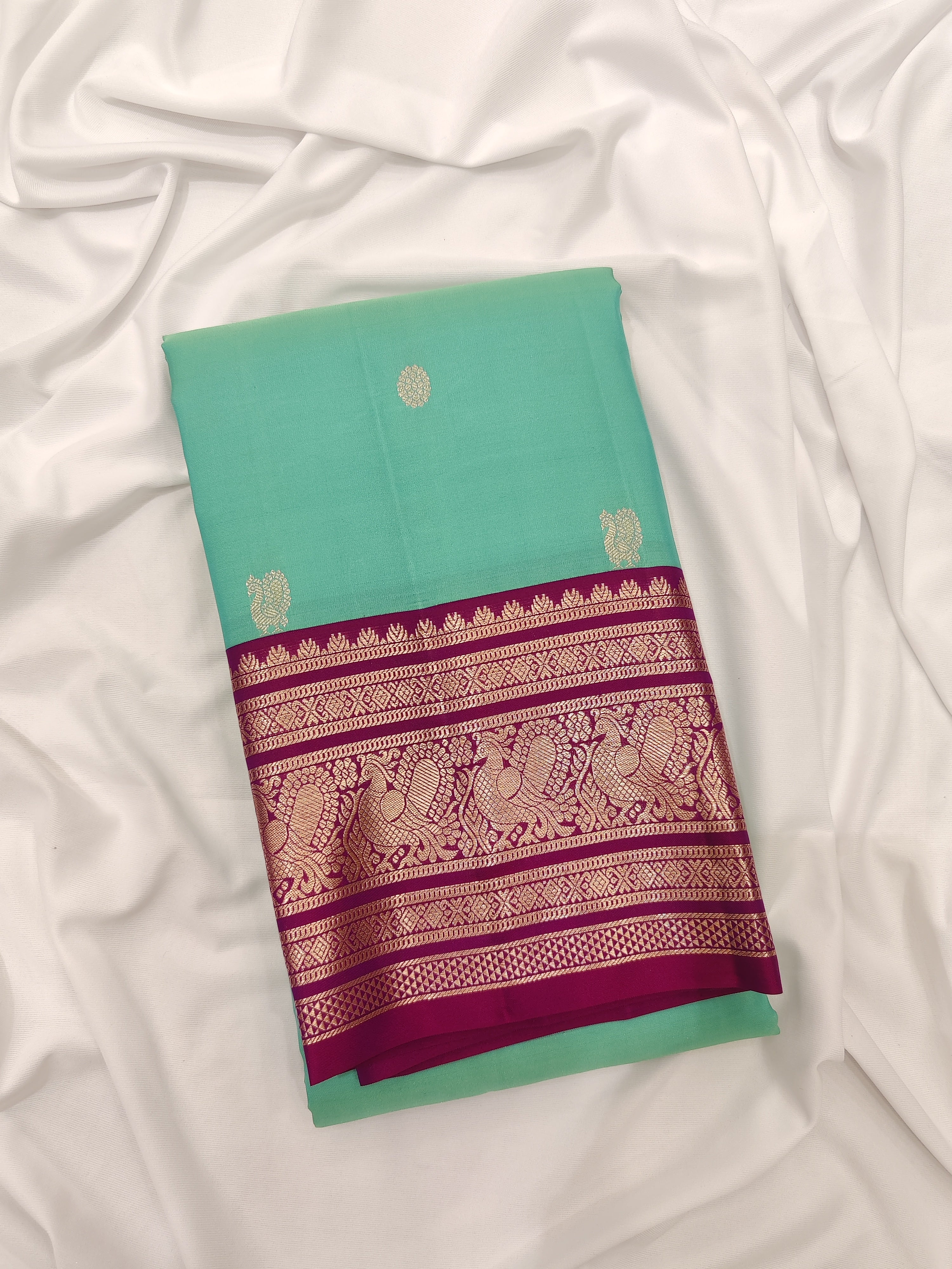 Leaf Green Kanjivaram Silk Saree with Pink Zari Border – Pure Handloom Festive Saree Online - New Sudarshan Silks`