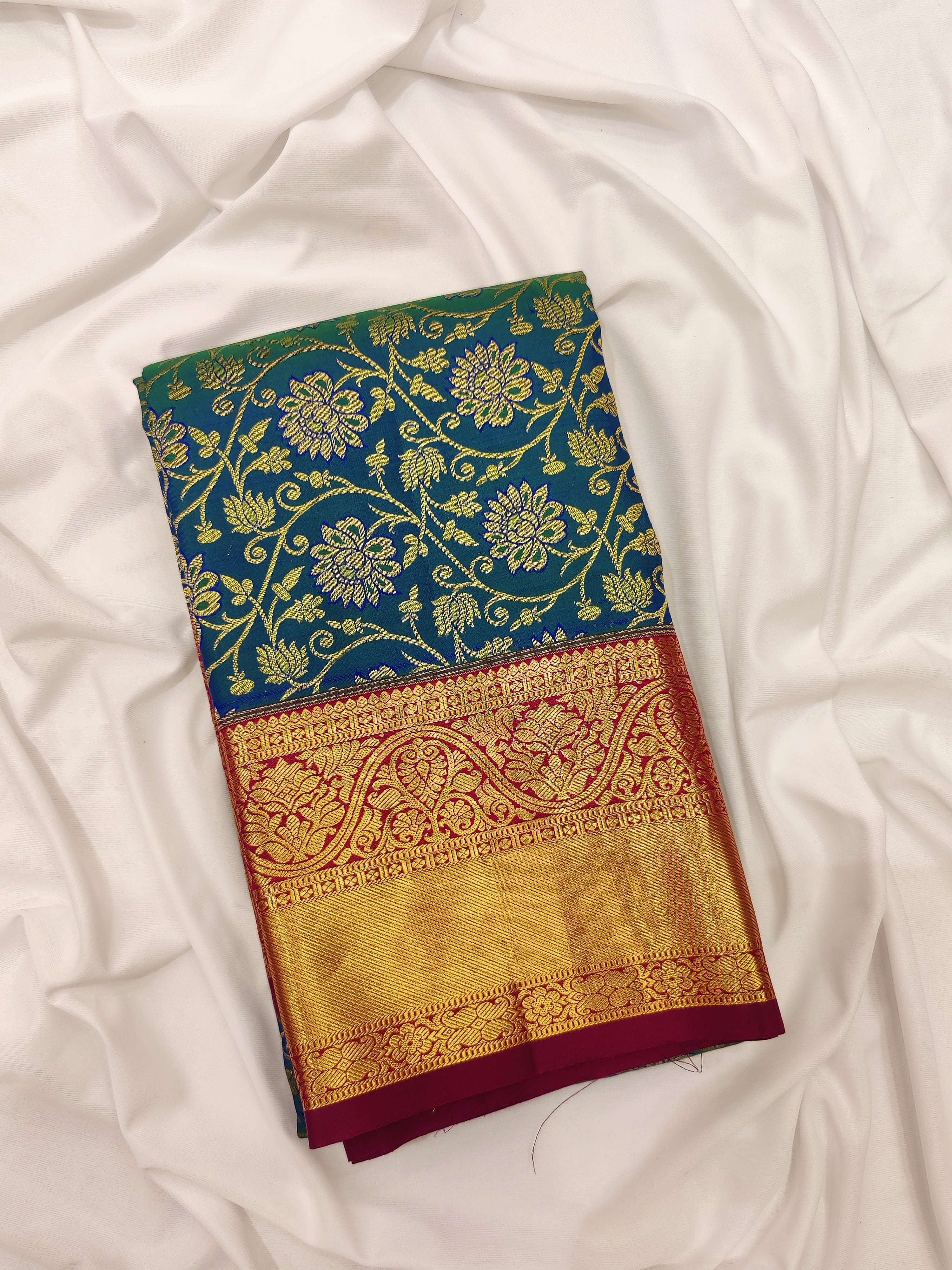 Peacock Blue Kanjivaram Silk Saree with Red Zari Border – Pure Handloom Traditional Saree Online - New Sudarshan Silks`