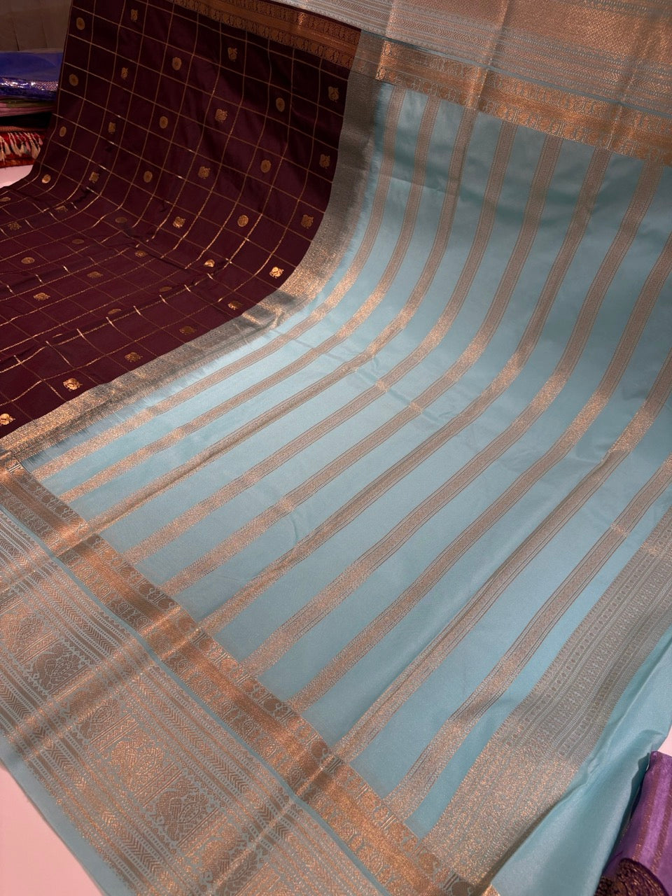 Chocolate Brown Colour Semi Kanchipramm Silk Saree with Sky Blue Border