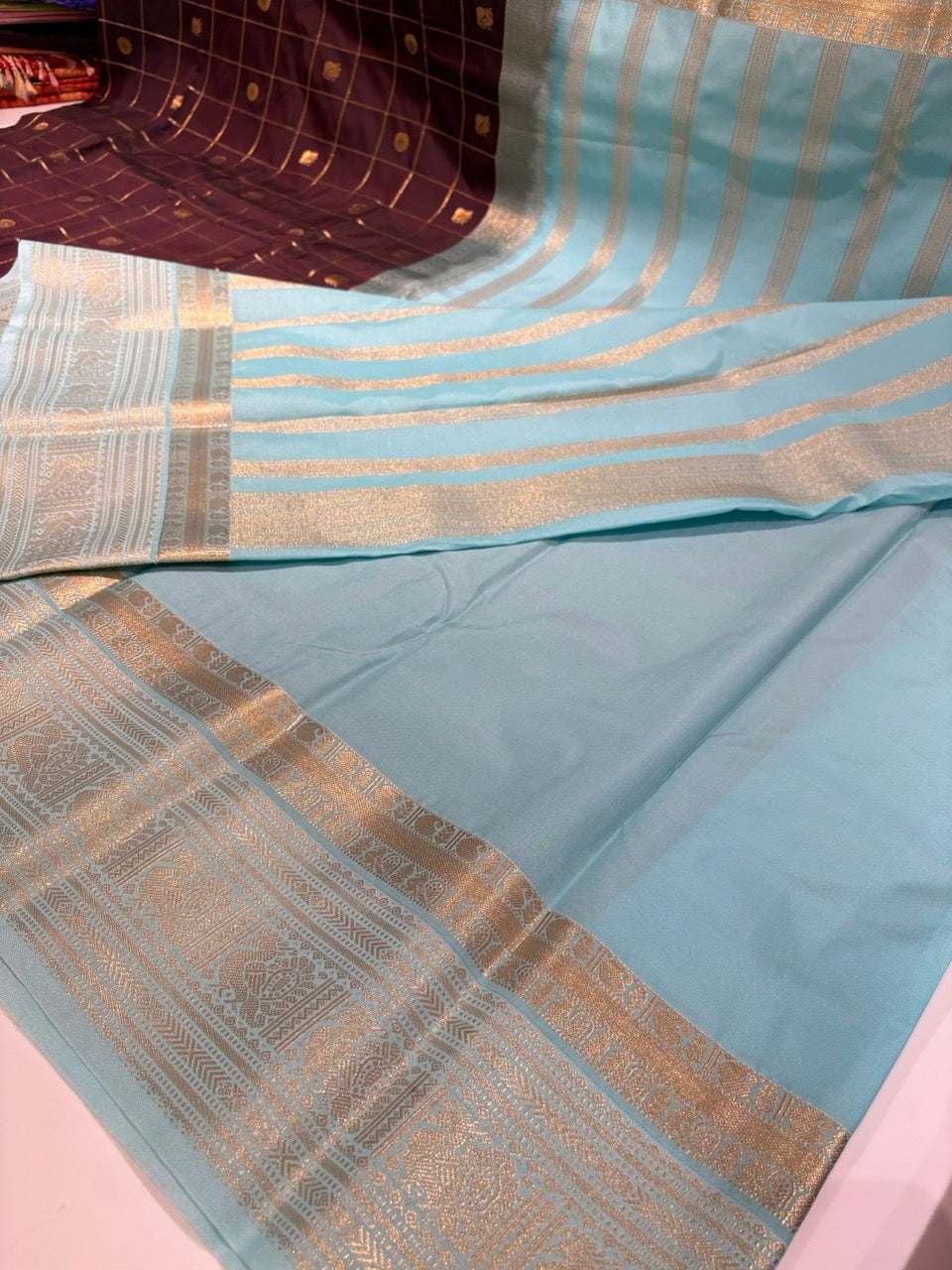 Chocolate Brown Colour Semi Kanchipramm Silk Saree with Sky Blue Border