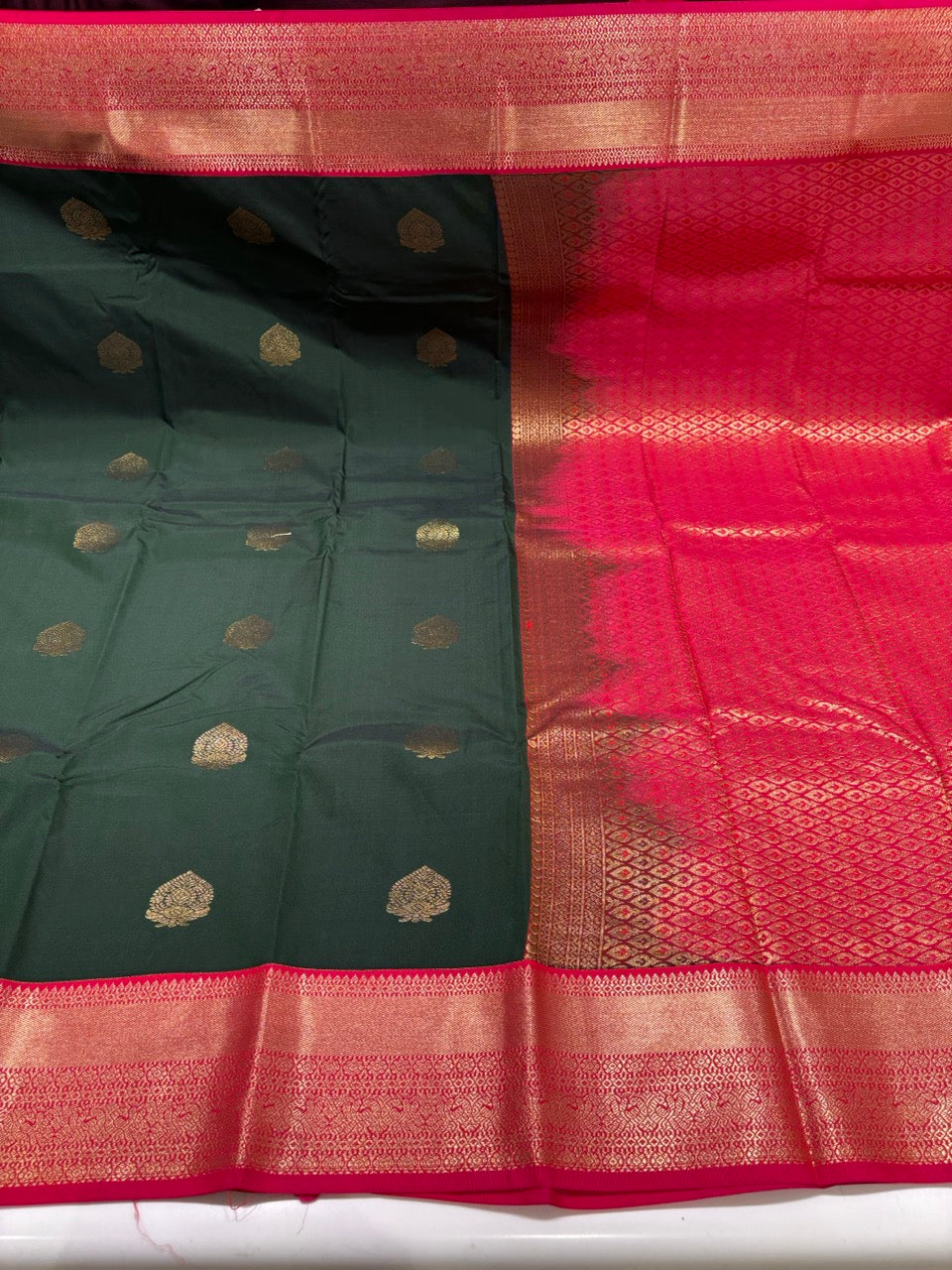 Emerald Green Colour Semi Kanchipuram Silk Saree with Pink Contrast