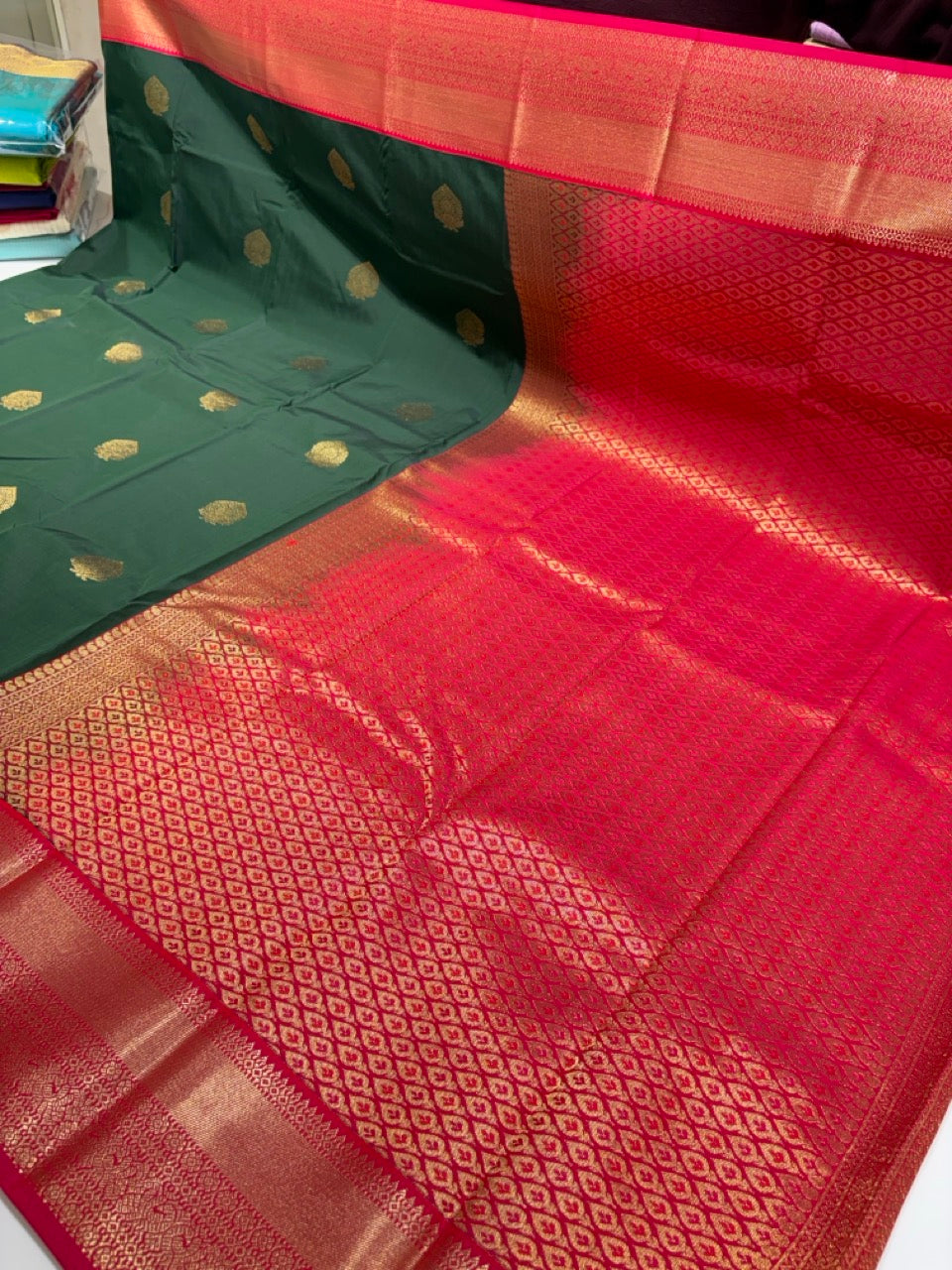 Emerald Green Colour Semi Kanchipuram Silk Saree with Pink Contrast