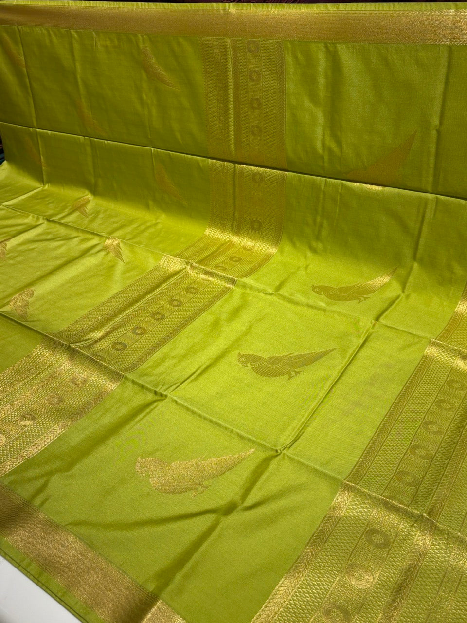 Olive Green Colour Semi Silk Saree with Gold Zari Border & Parrot Butta