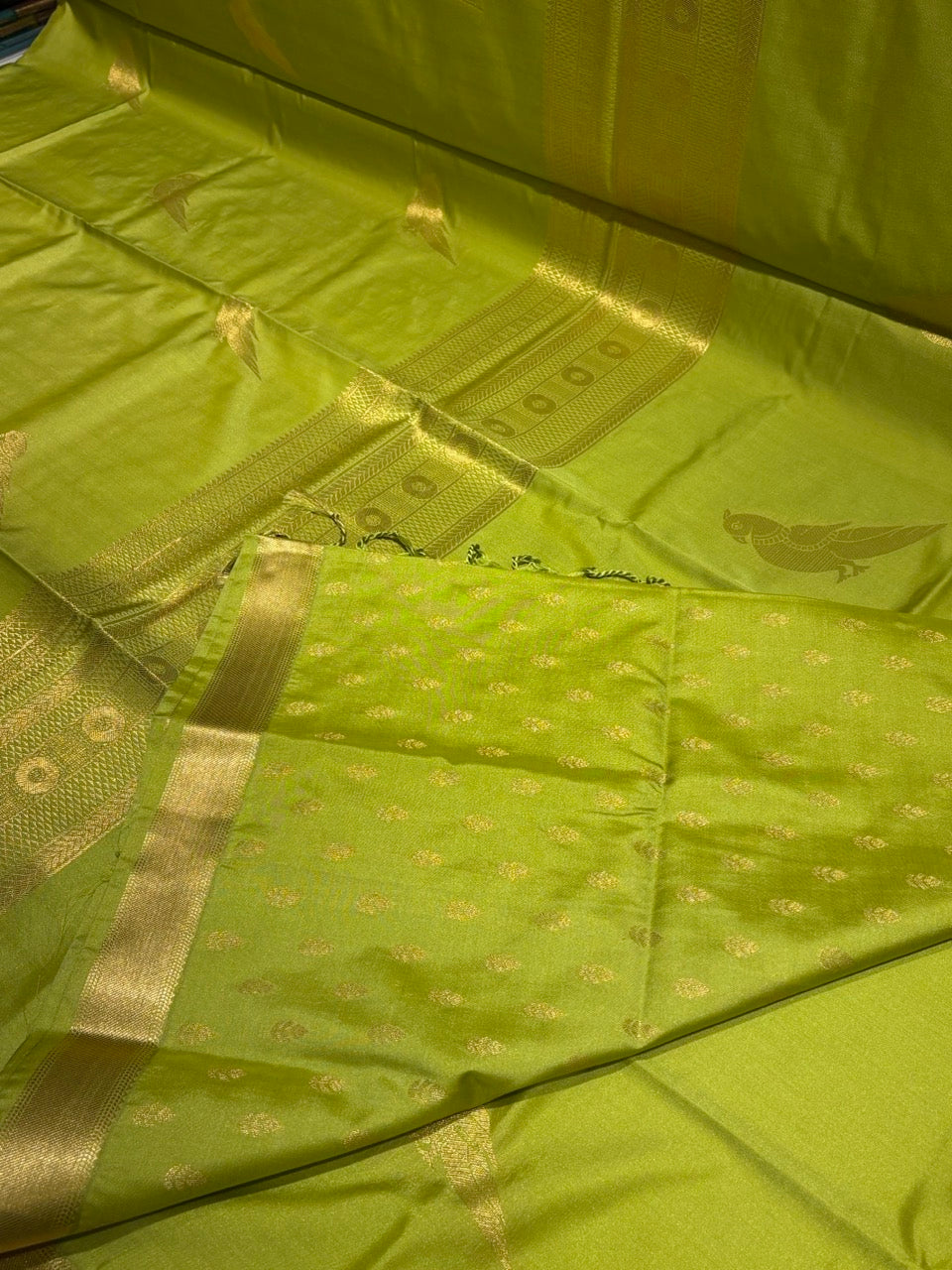 Olive Green Colour Semi Silk Saree with Gold Zari Border & Parrot Butta