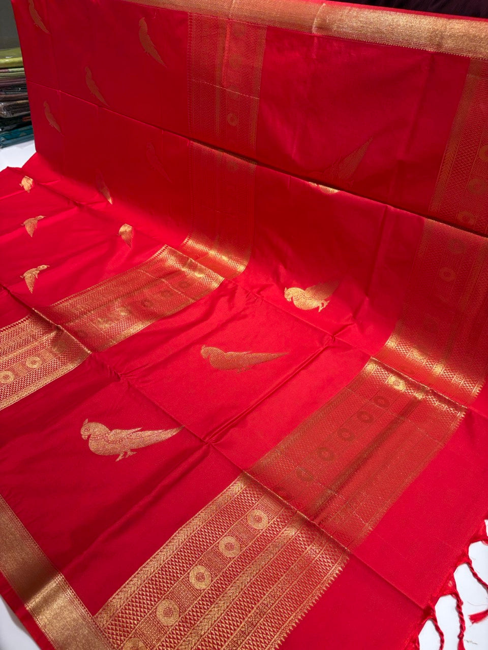 Red Colour Semi Silk Saree with Gold Zari Border & Parrot Butta