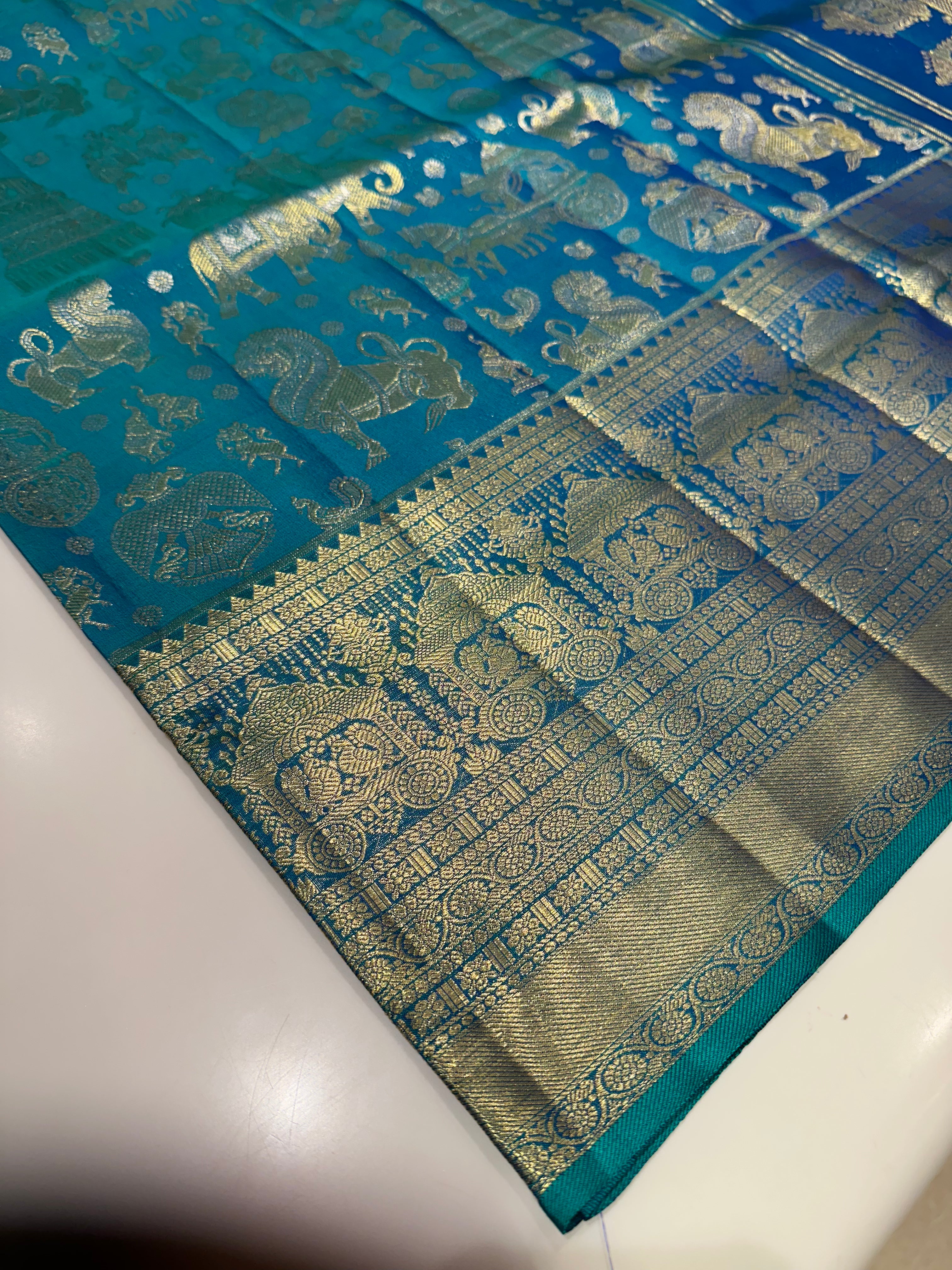 Royal Blue Pure Kanjivaram Silk Saree with Gold & Silver Zari Animal Motifs