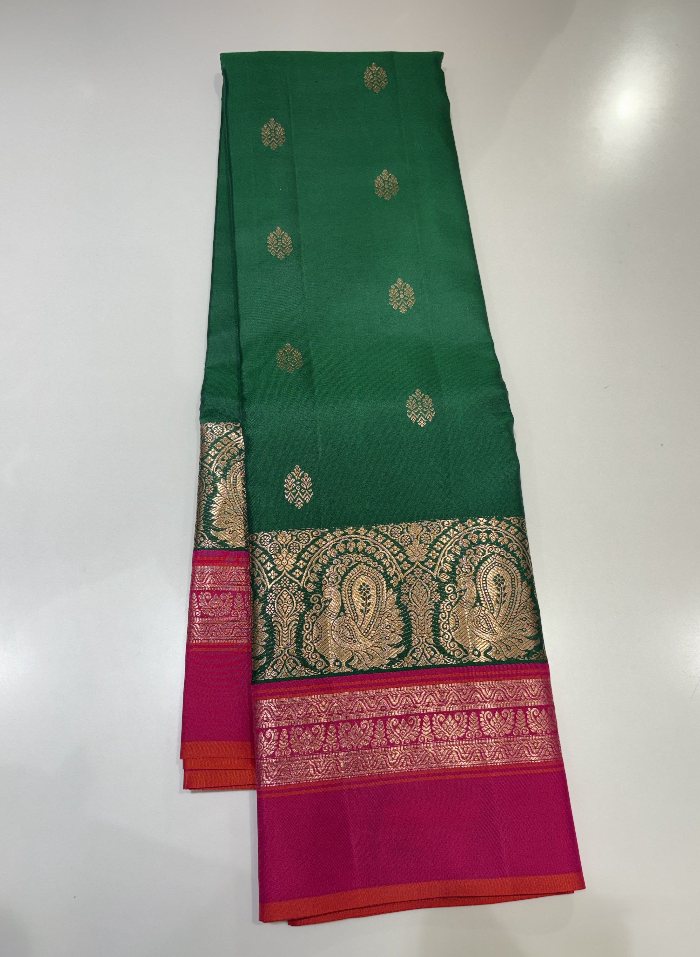Exquisite Bottle Green Pure Kanjivaram Silk Saree with Magenta Pink Contrast