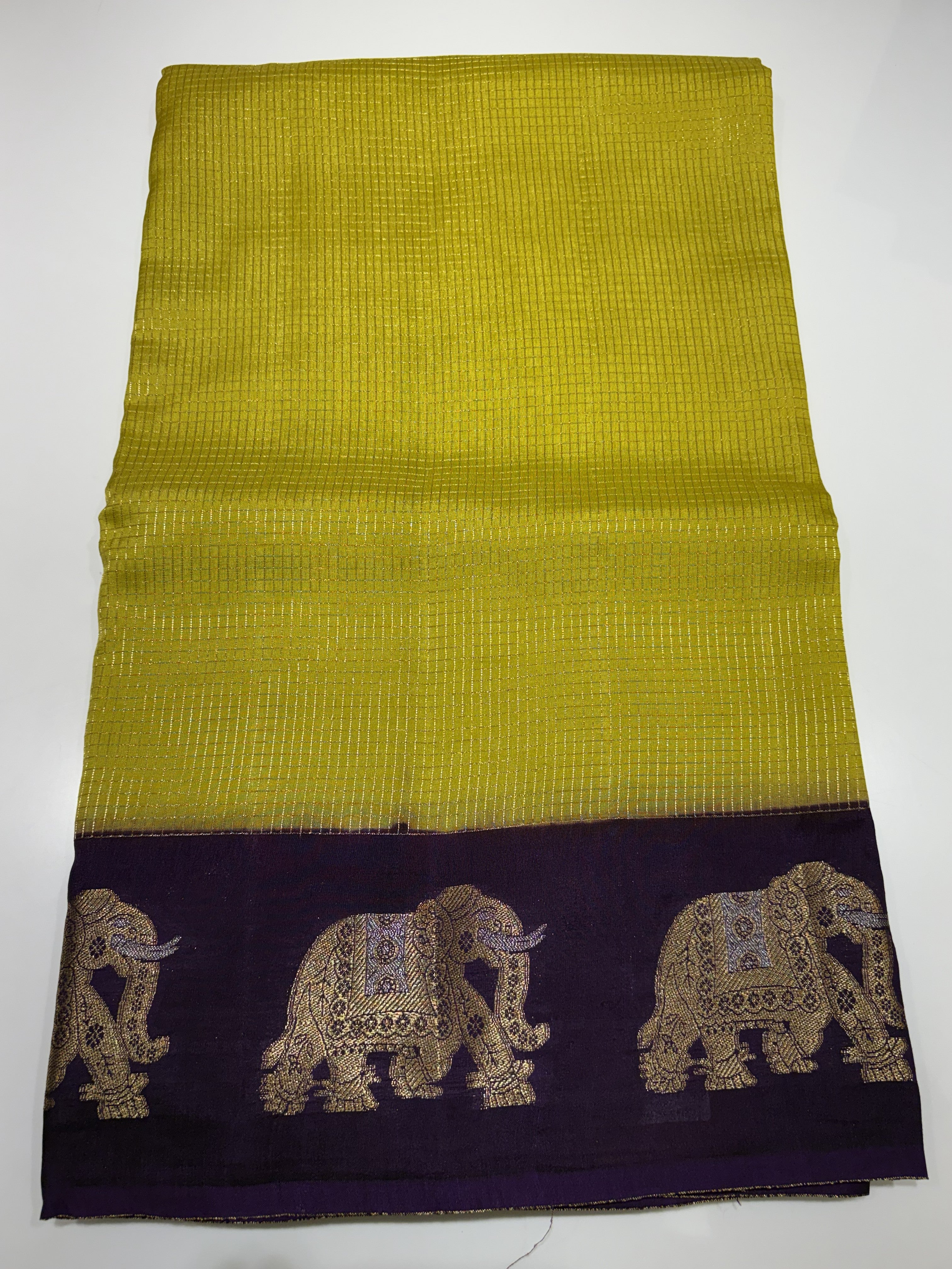 Beautiful Yellow Fancy Saree With Purple Contrast And Elephant Motifs on its Border