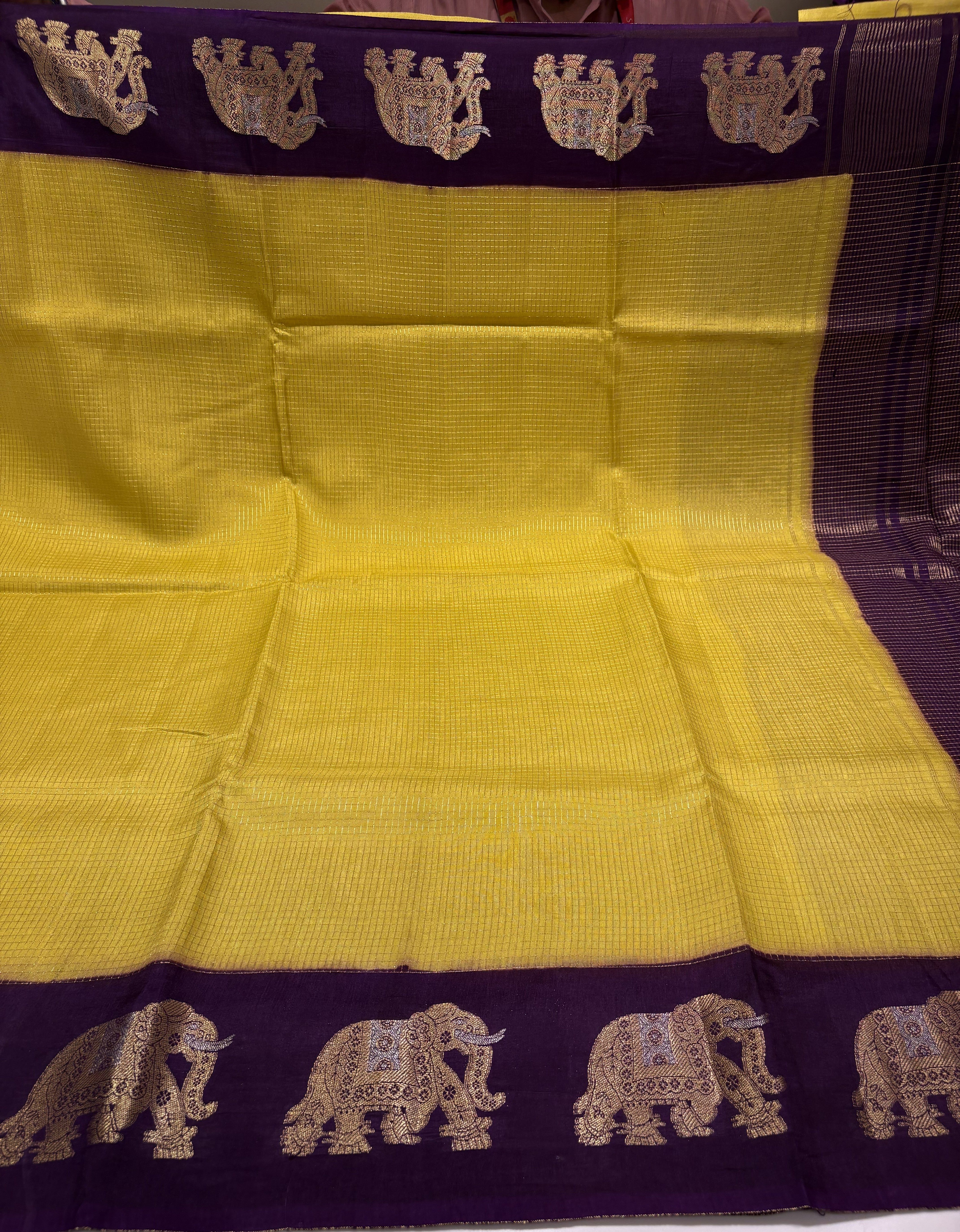 Beautiful Yellow Fancy Saree With Purple Contrast And Elephant Motifs on its Border