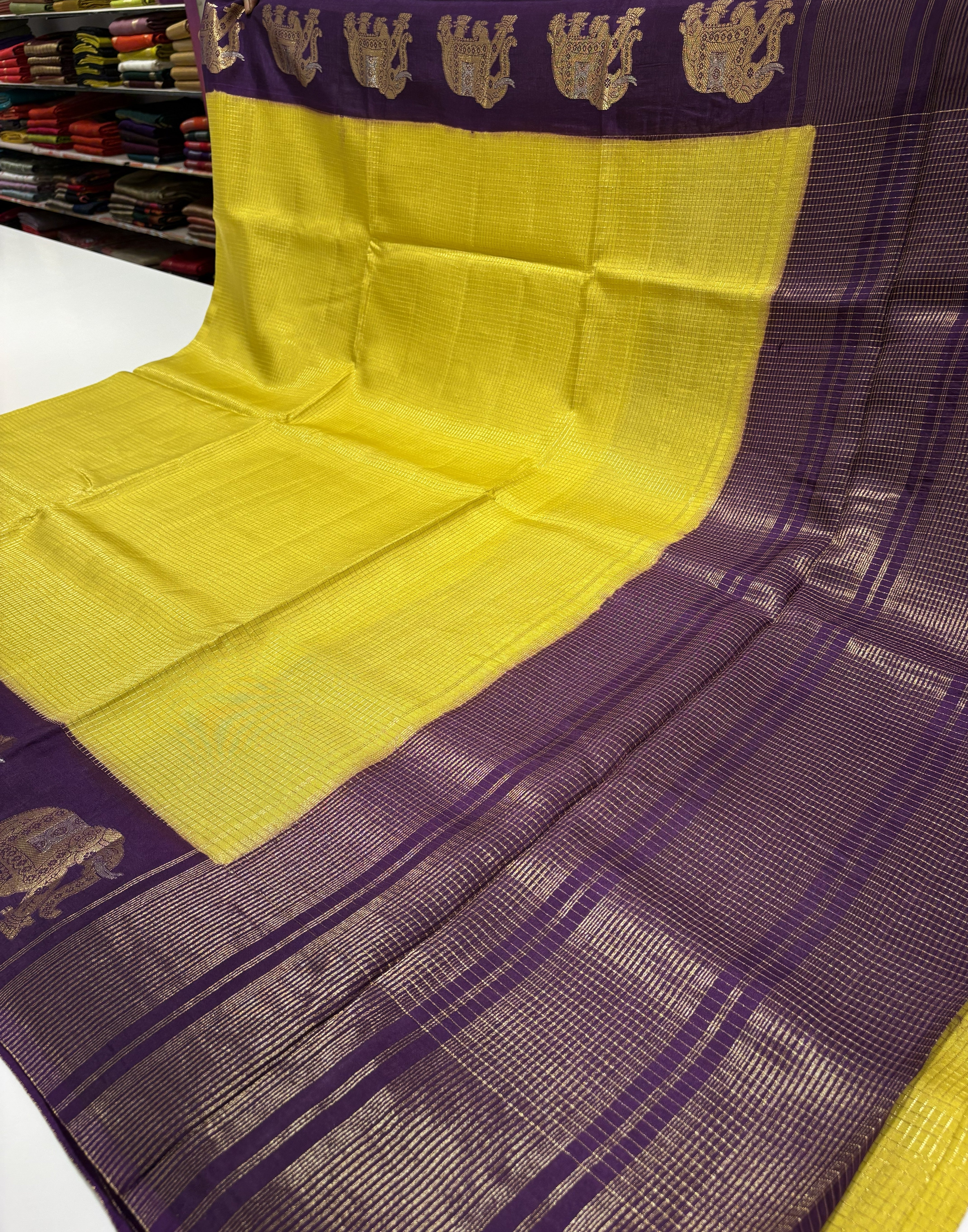 Beautiful Yellow Fancy Saree With Purple Contrast And Elephant Motifs on its Border