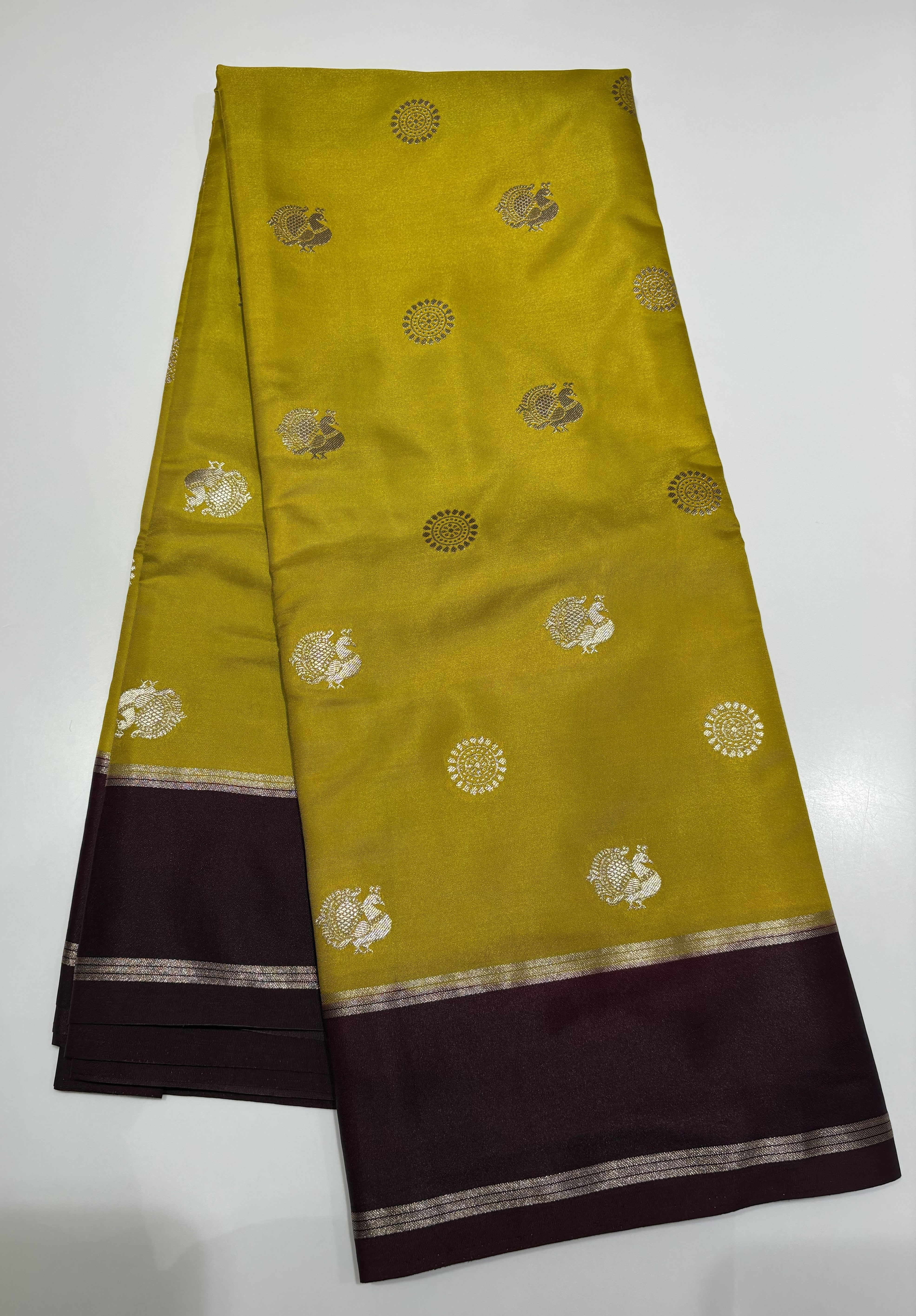 Elegant Lemon Yellow Raw Silk Saree With Brown Contrast