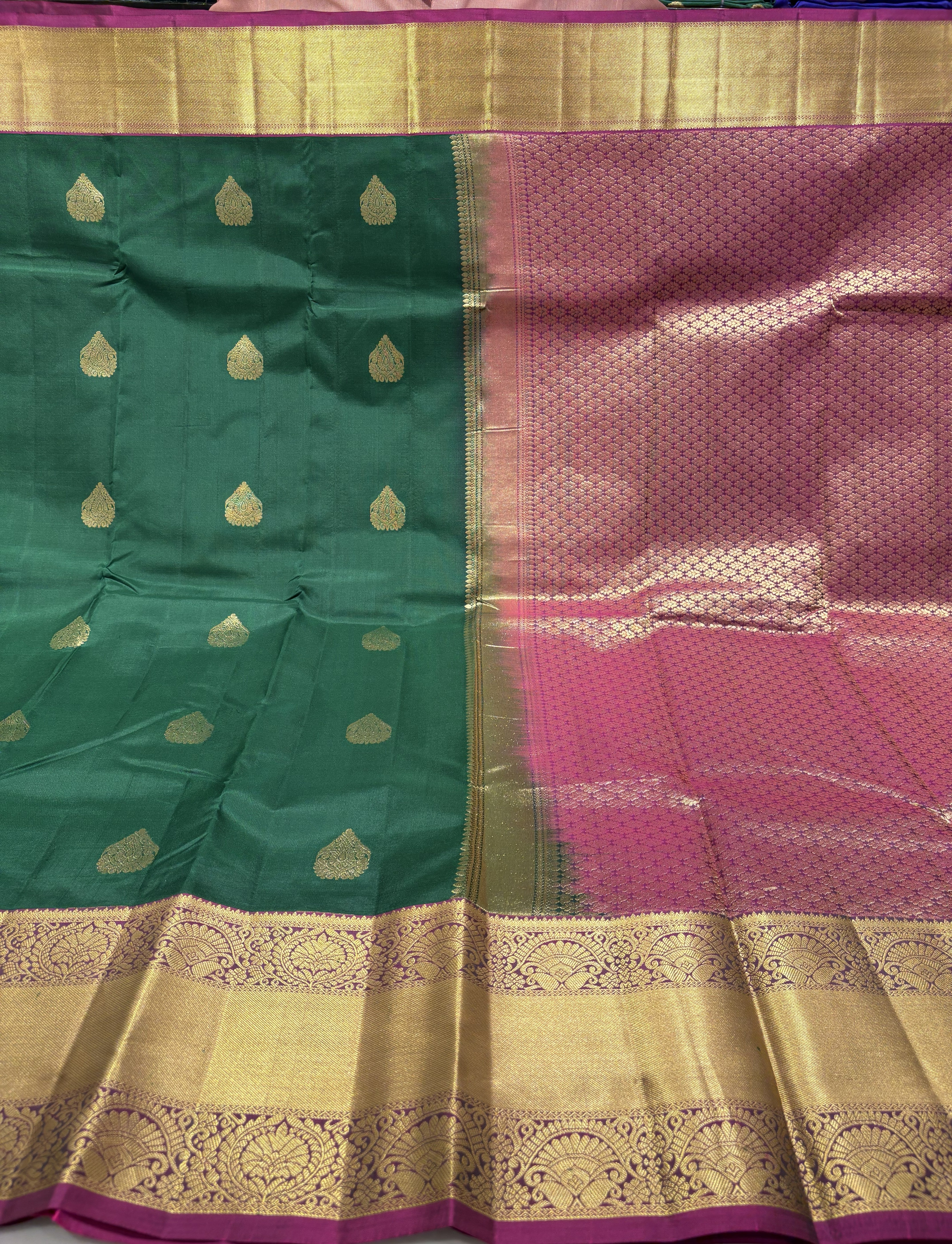 Traditional Bottle Green Pure Kanchipuram Silk Saree with Dual Shade Purple Contrast – Elegant Ethnic Attire
