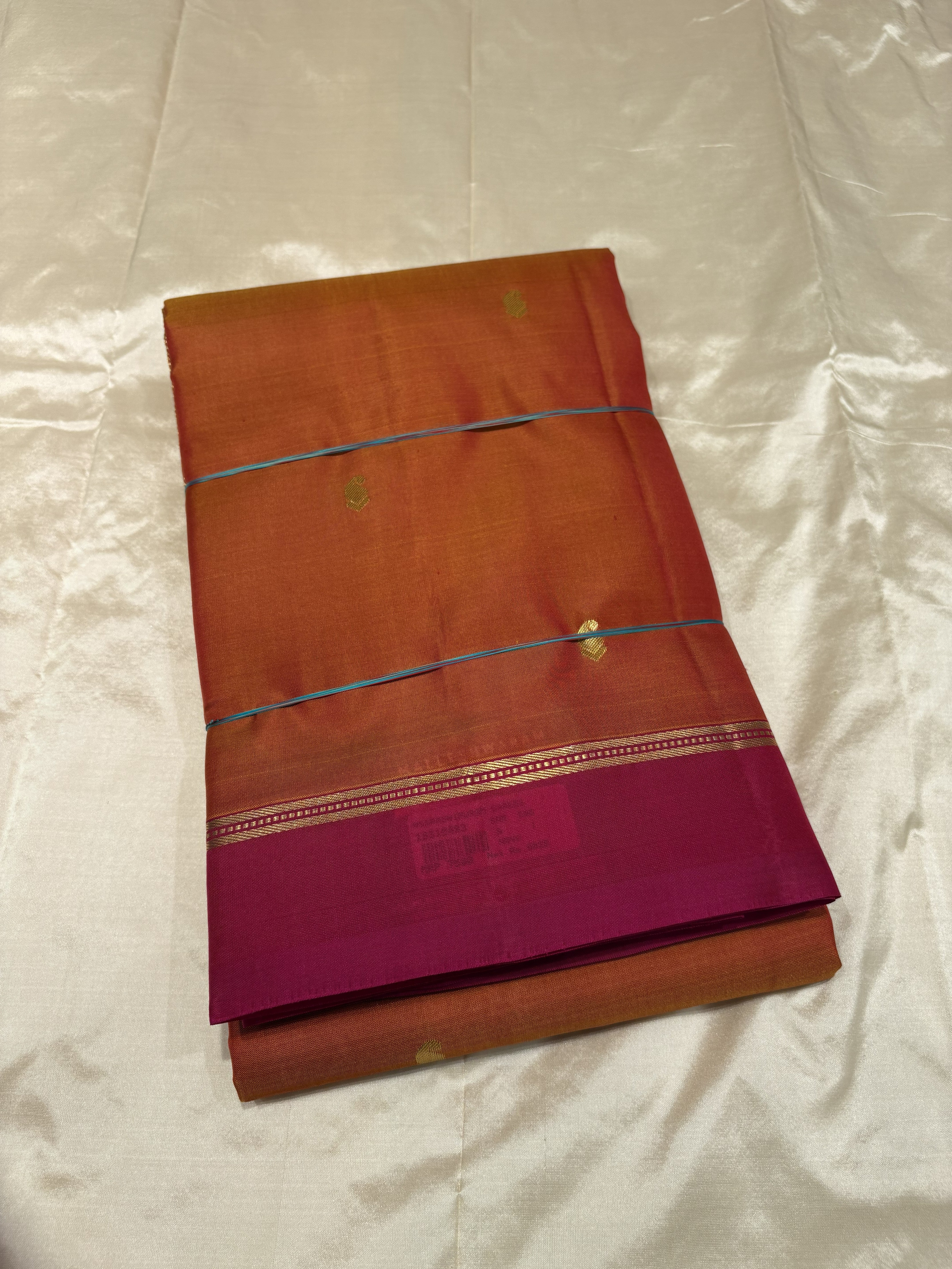 Elegant Orange Pure Kanchipuram Silk Saree with Rani Pink Contrast