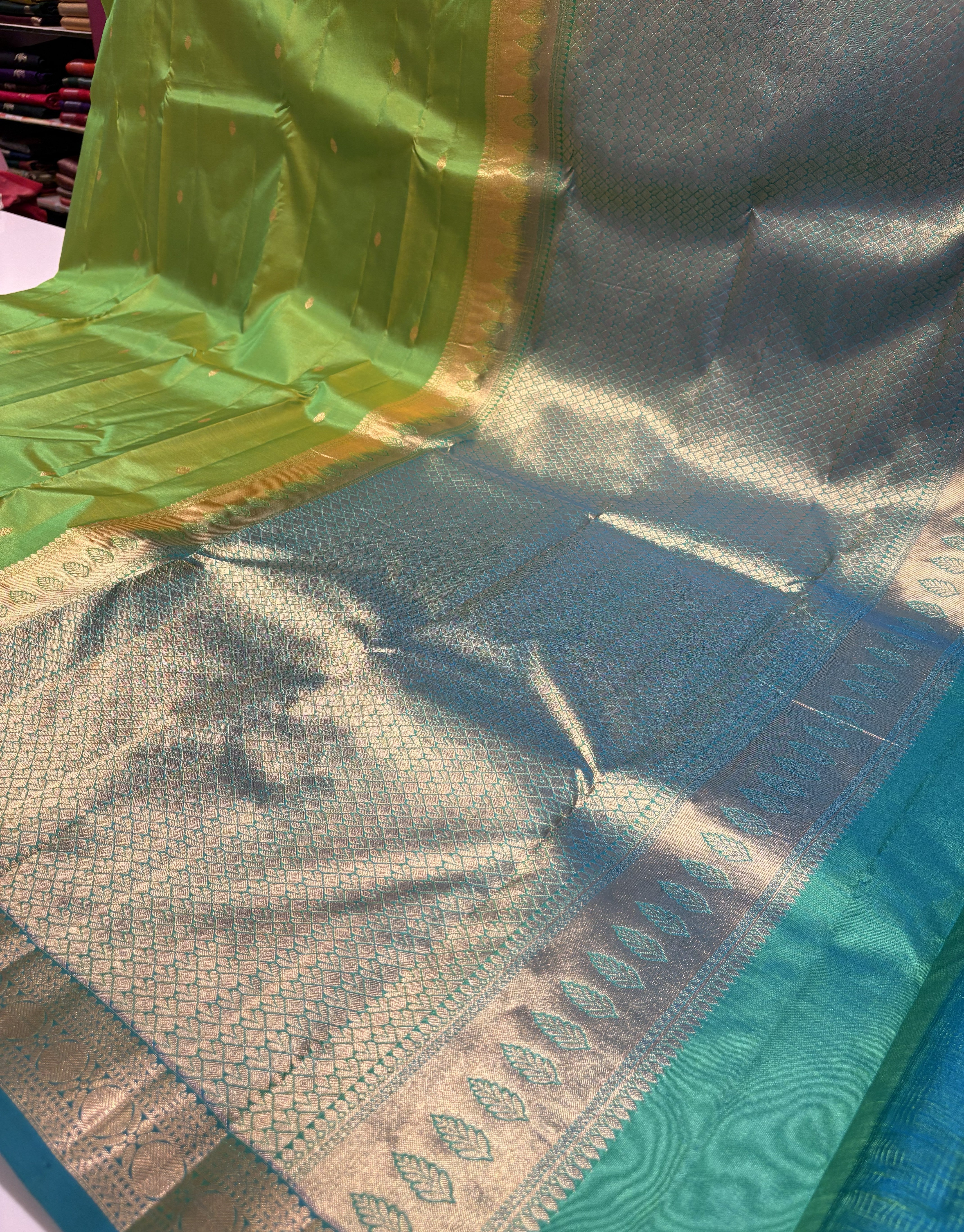 Vibrant Parrot Green Pure Kanchipuram Silk Saree With Ocean Blue Contrast