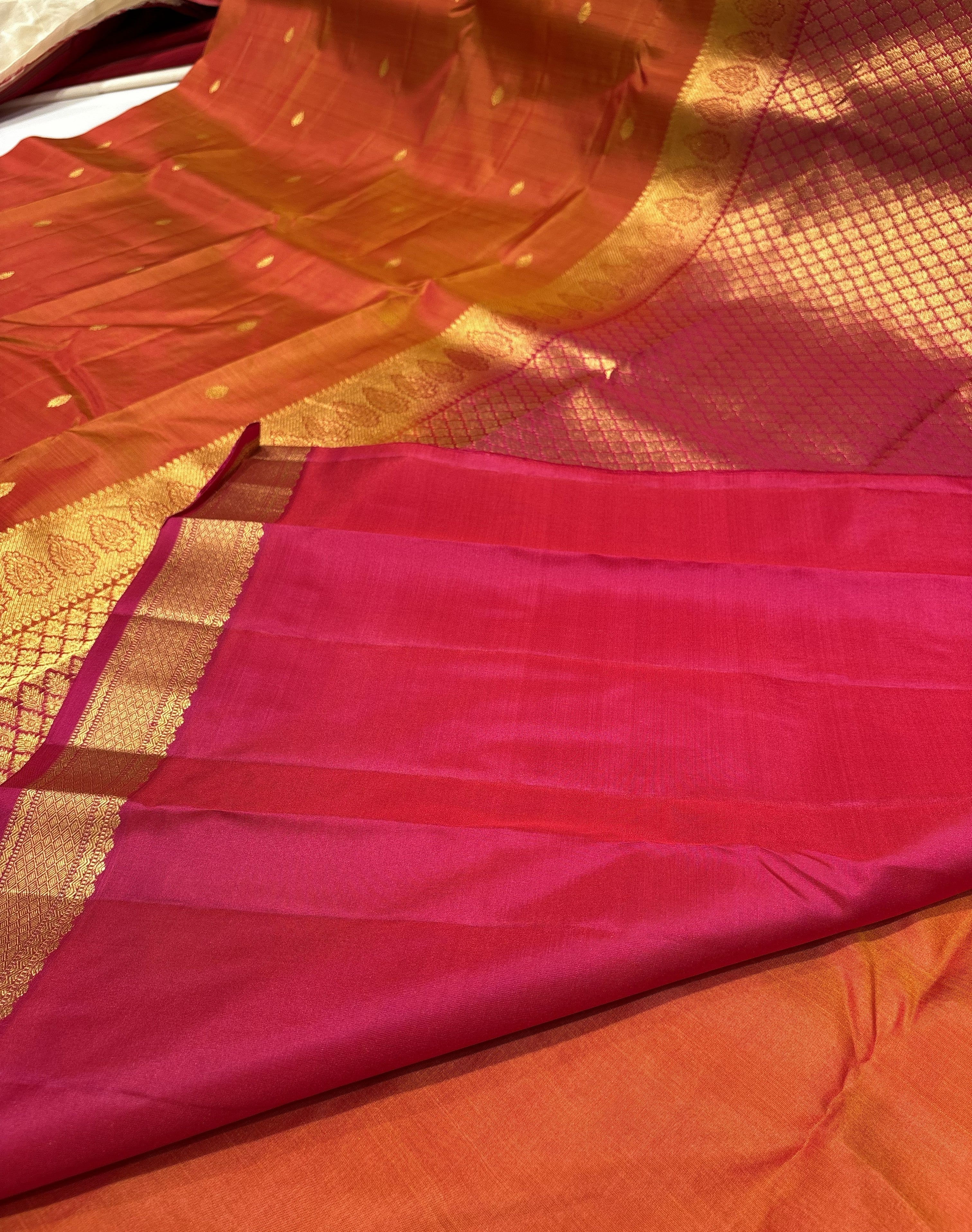 Vibrant Orange Pure Kanchipuram Silk Saree With Rani Pink Contrast