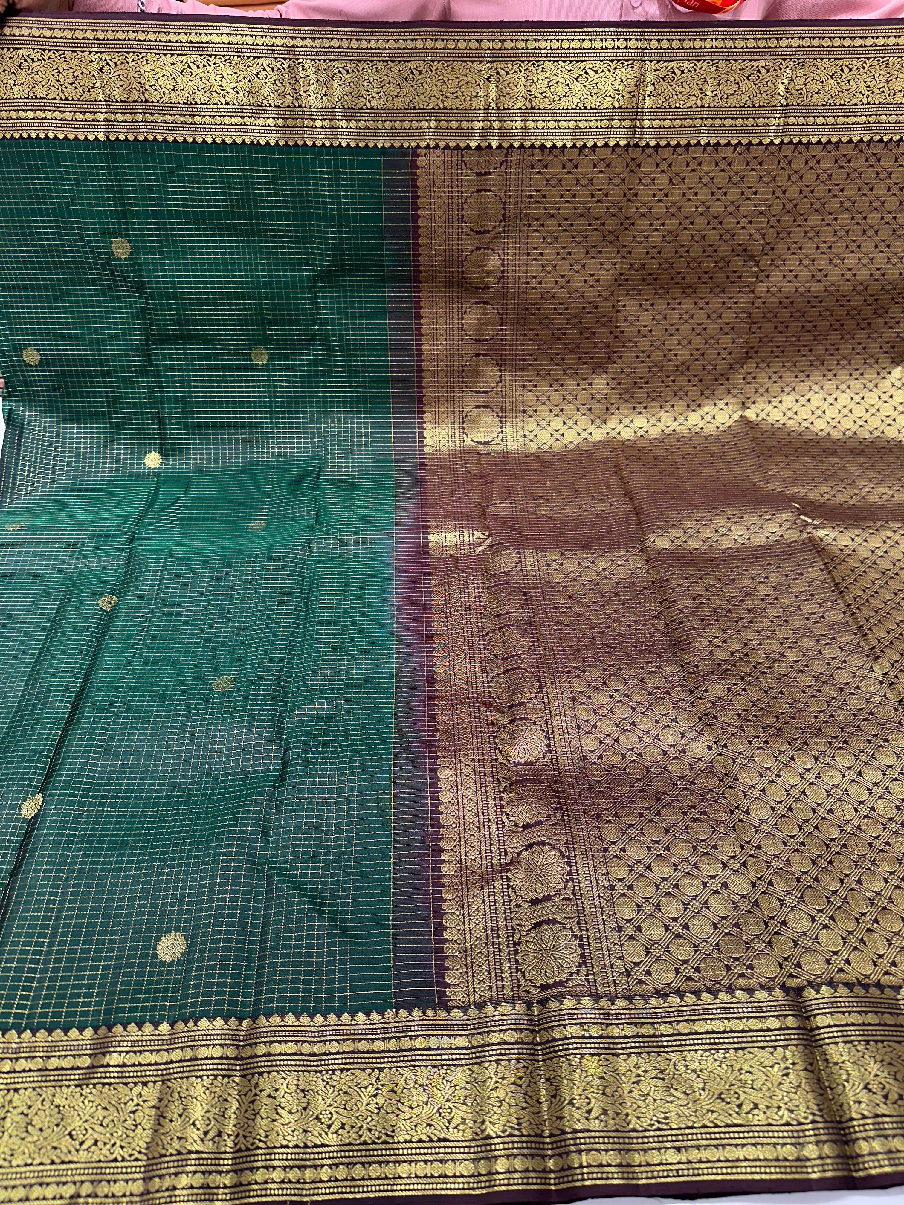 A Grand Zari Butta Kanjivaram Silk wedding saree in Green & Brown