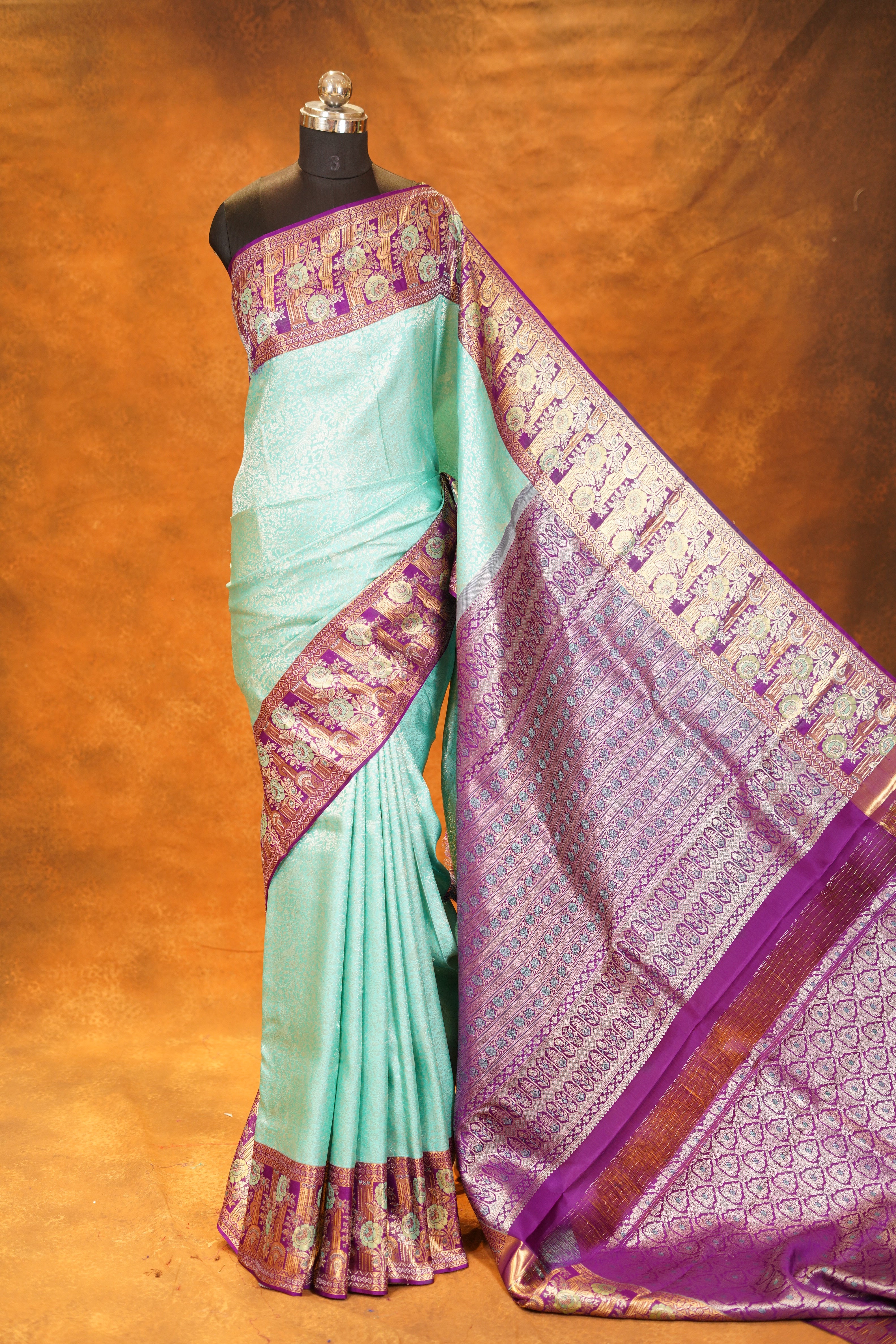 Pastel Green colour Pure Kanjivaram Silk Saree with Purple contrast