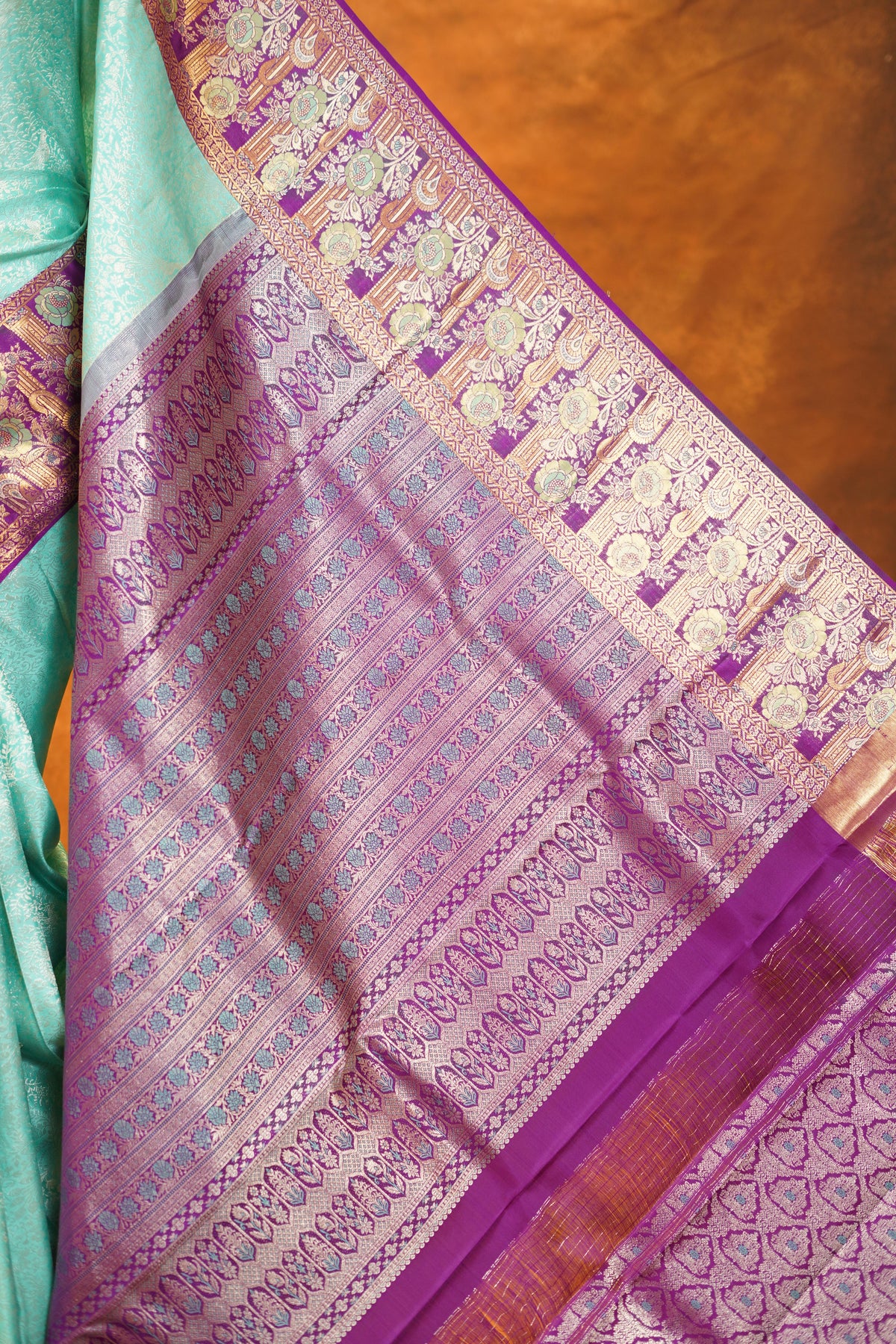 Pastel Green colour Pure Kanjivaram Silk Saree with Purple contrast