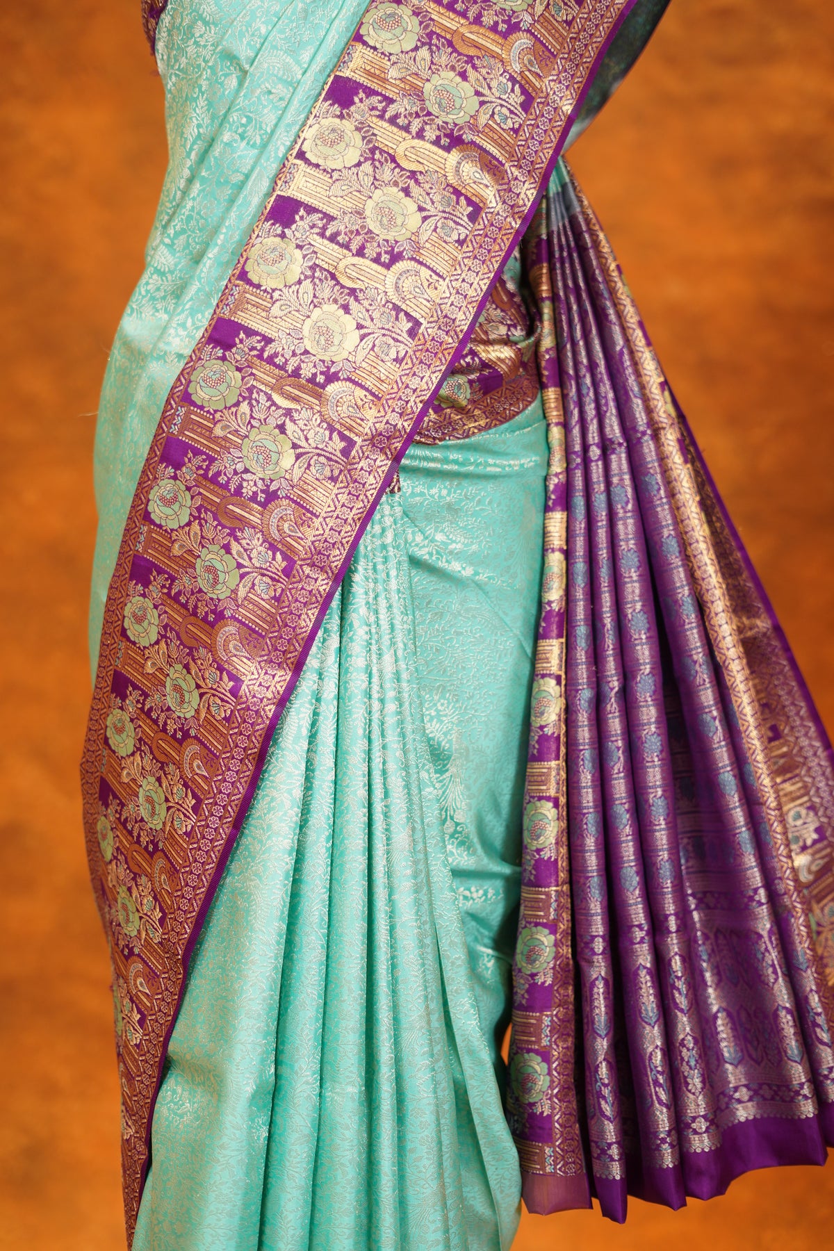 Pastel Green colour Pure Kanjivaram Silk Saree with Purple contrast