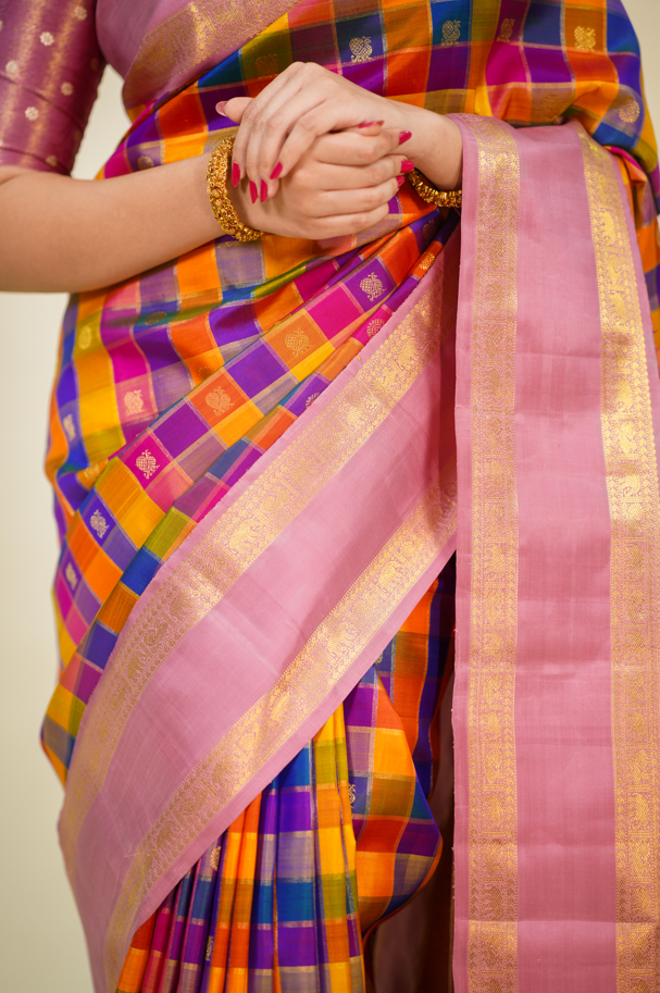 Multicolor Pure Kanjivaram Silk Saree with Pink Contrast Border & Golden Zari Buttas – Bridal & Wedding Wear