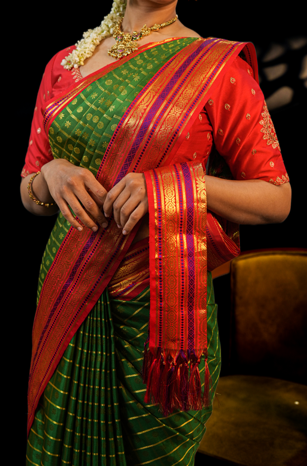 Green & Red Pure Kanjivaram Silk Saree with Rich Golden Zari Buttas – Traditional Bridal & Festive Wear