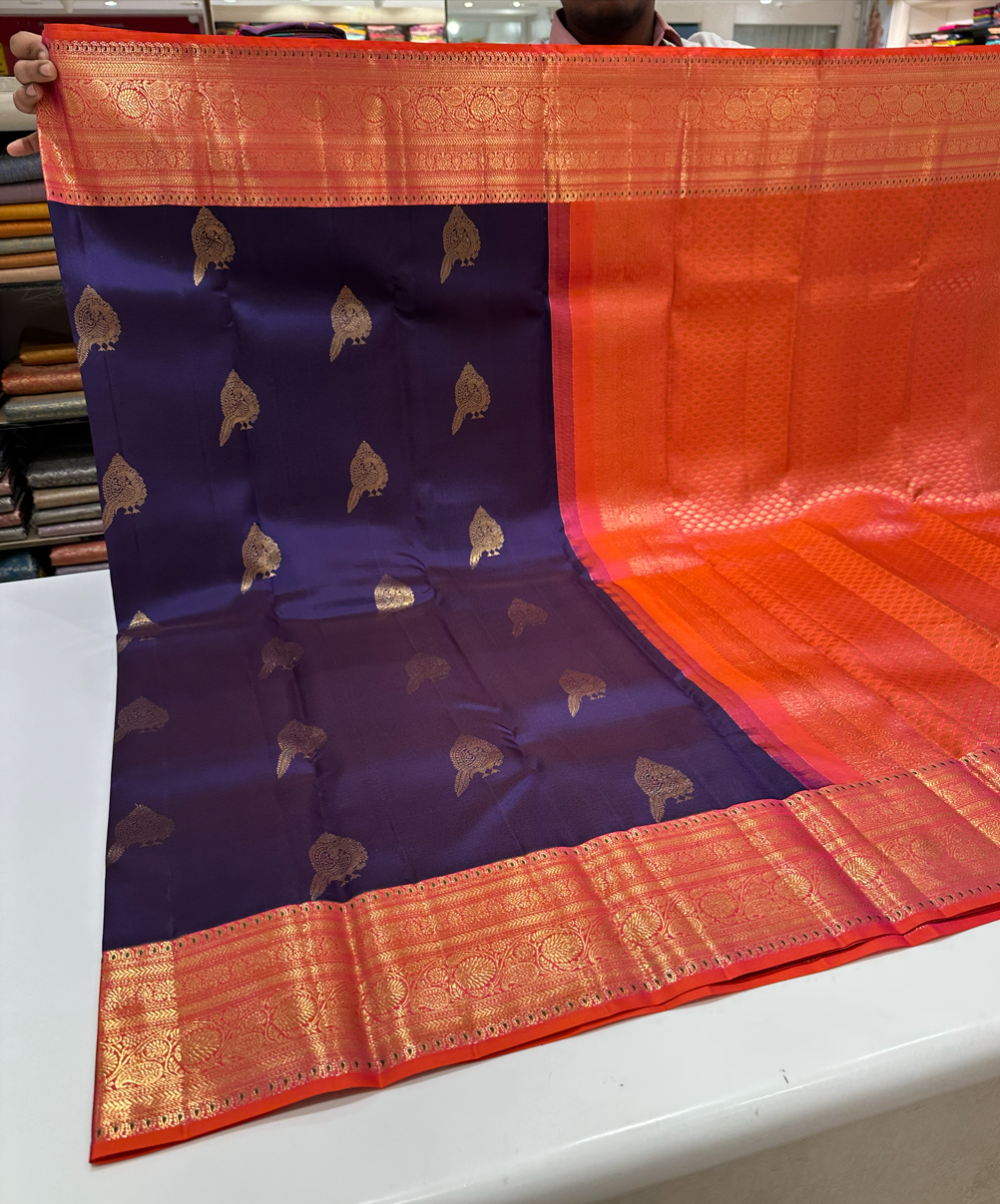 Purple Dual Shade Kanjivaram Saree with Orange & Pink Border & Floral Buttas – Traditional Wear