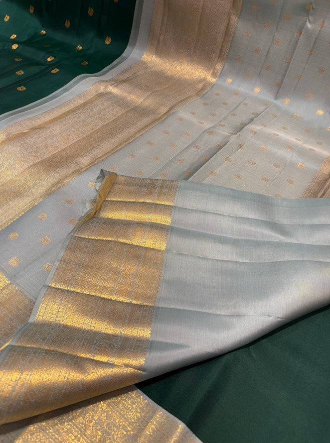 Green Color Pure Kanjivaram Silk Saree with Contrast Light Blue Border & Gold Zari butta