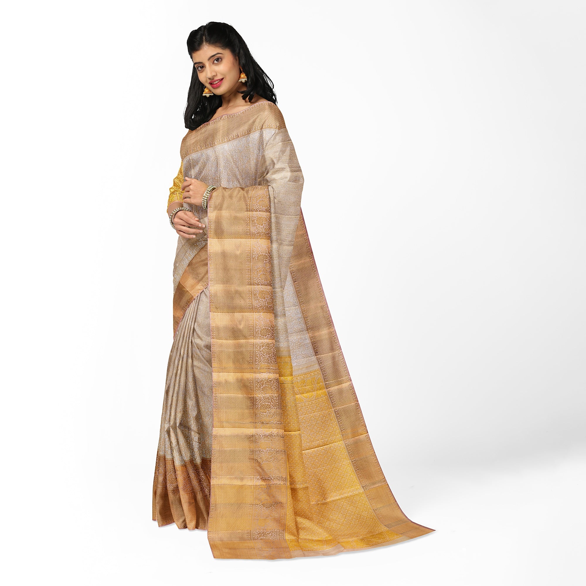 Cream Wedding Saree with Gold Zari Work – A Classic Bridal Beauty
