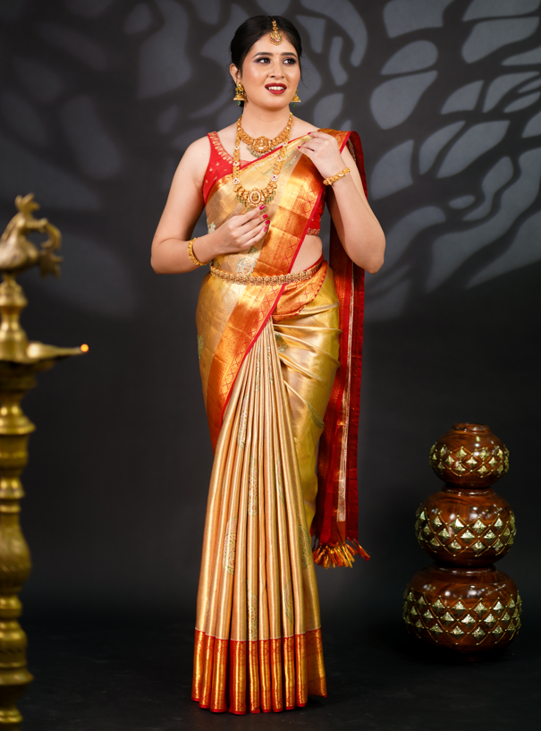 Pure Kanjivaram Silk Saree in Gold with Rich Golden Zari & Red Contrast Border – Traditional Bridal & Wedding Collection