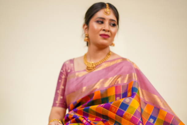 Multicolor Pure Kanjivaram Silk Saree with Pink Contrast Border & Golden Zari Buttas – Bridal & Wedding Wear