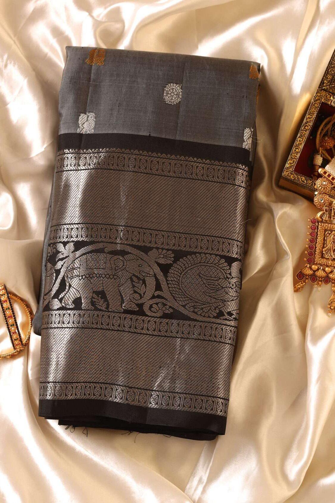 Ash and Black Border Gadhwal Silk Saree: Graceful Attire - New Sudarshan Silks`