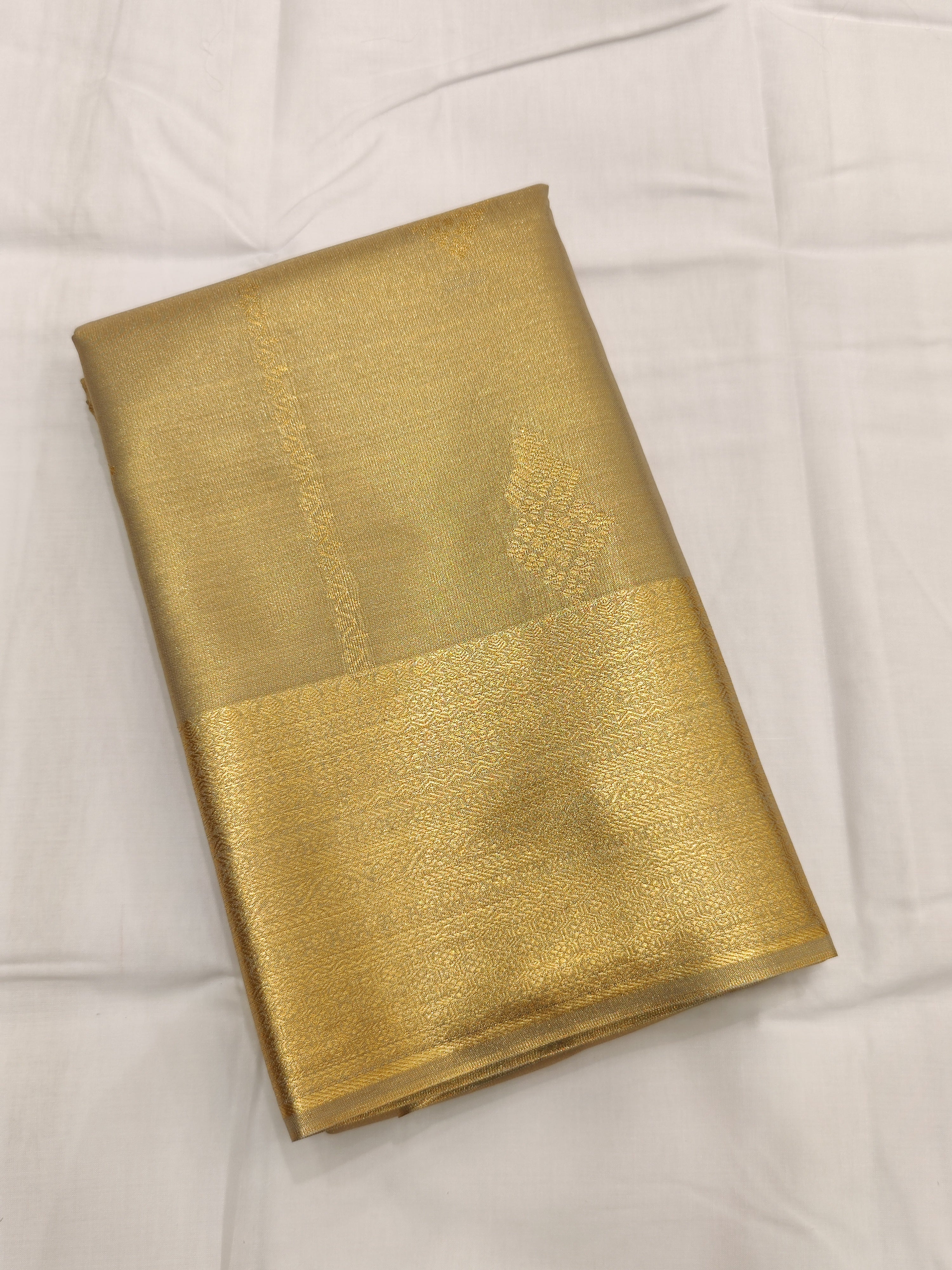 Elegant Light Grey Semi Tissue Saree with Zari Butta and Gold Border