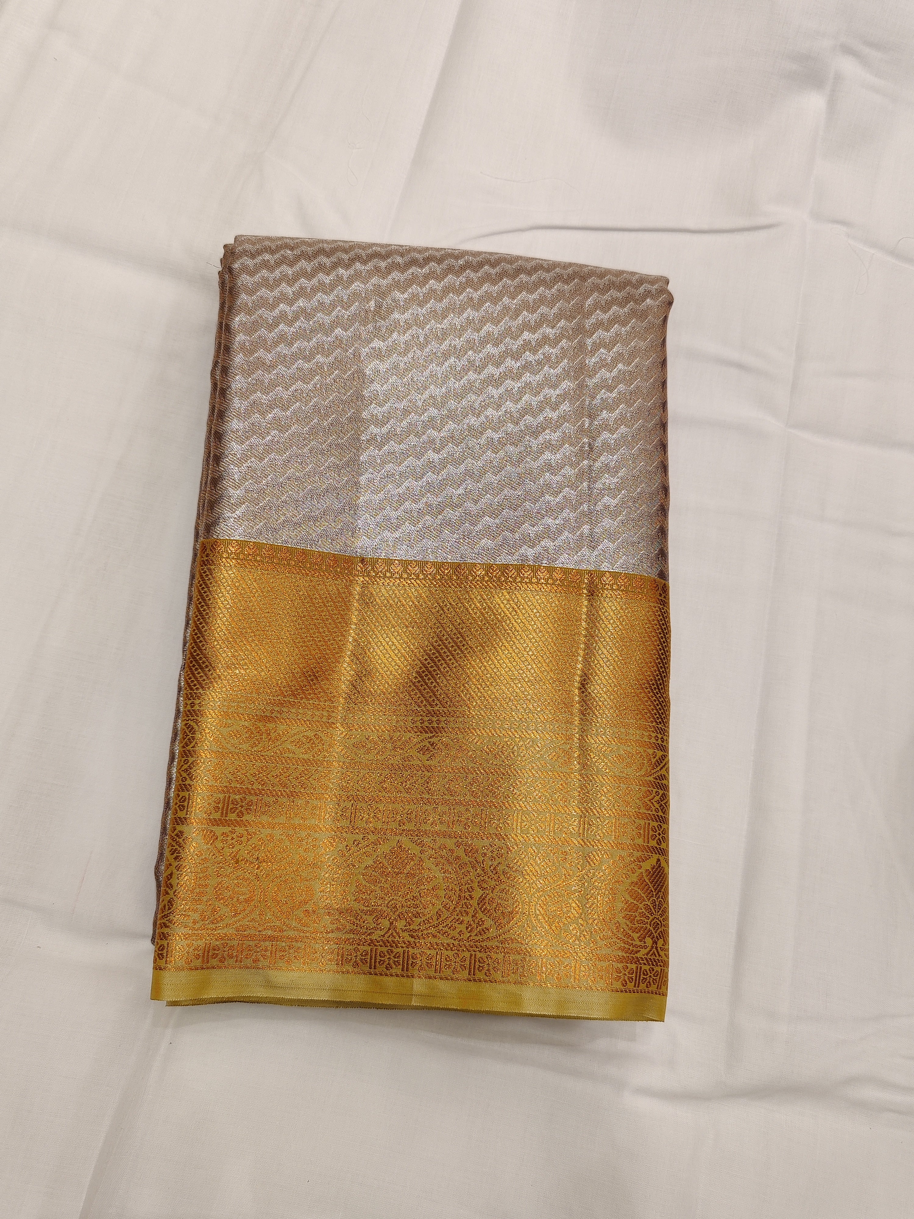 Chic Silver Saree with Elegant Line Design and Gold Border