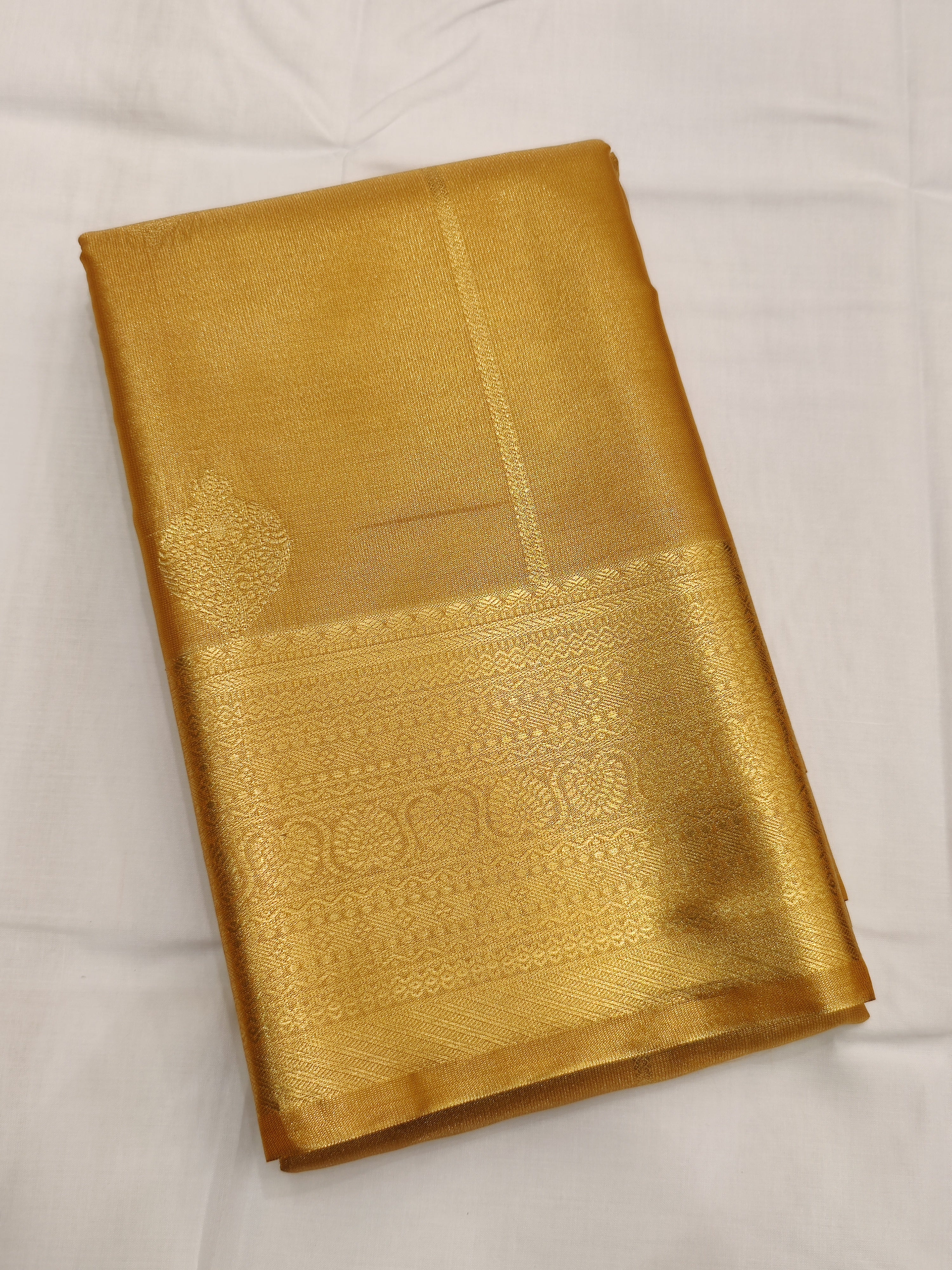 Elegant Gold Saree with Intricate Butta Design and Matching Gold Border