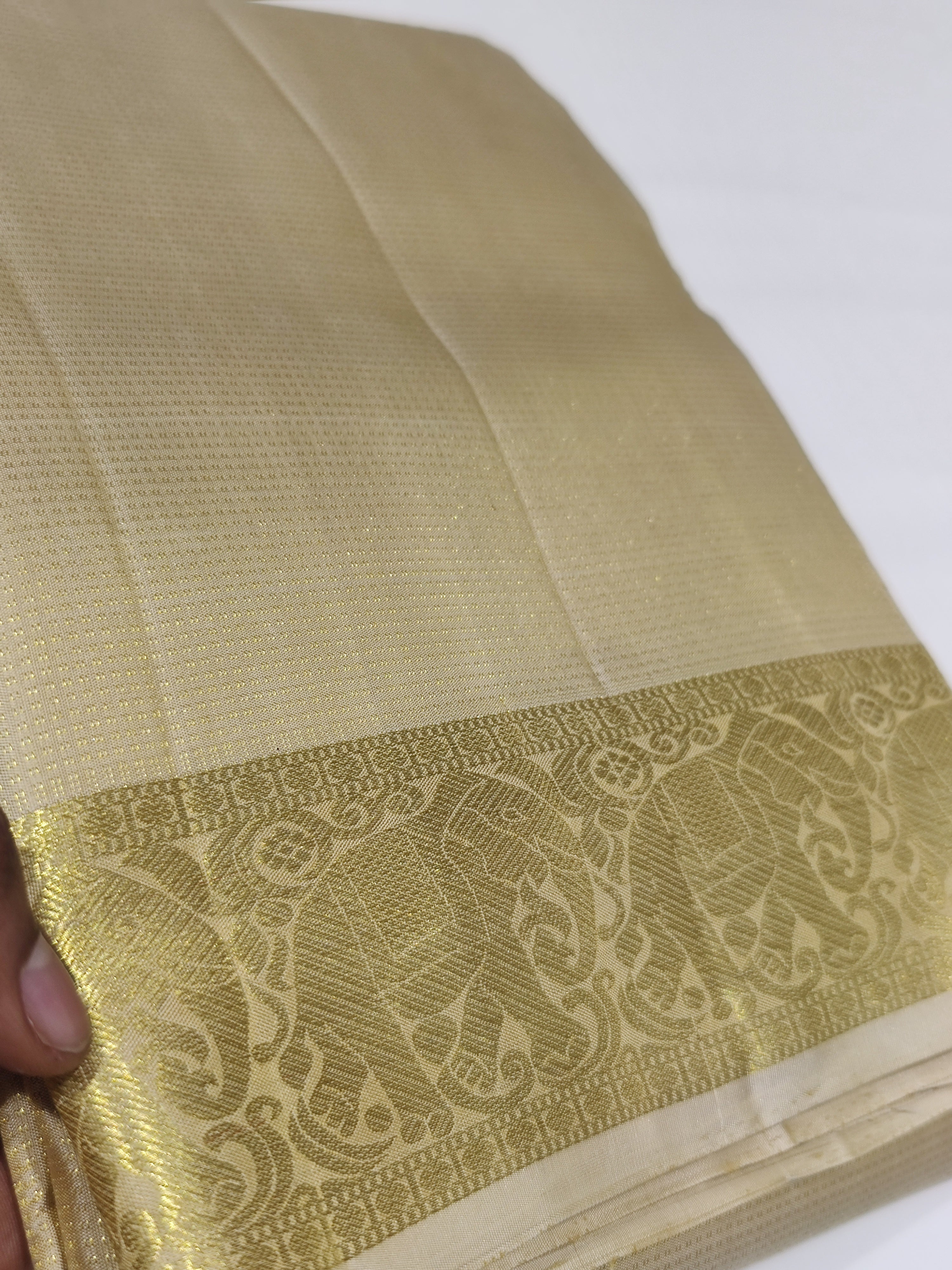 "Gold Kanjivaram Silk Dhoti with Elephant Border – Wedding Collection for Men"