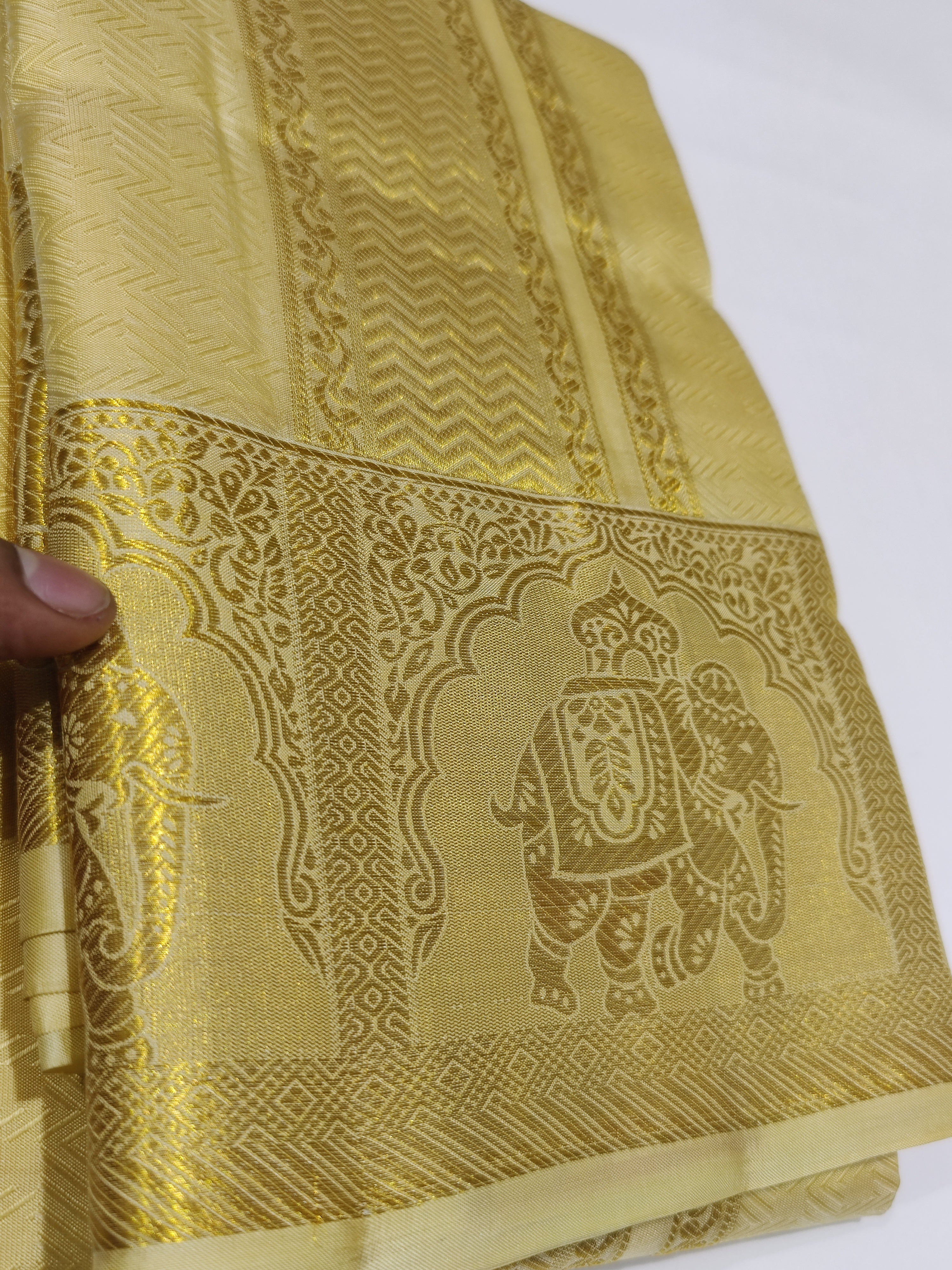 "Pure Gold Kanjivaram Silk Dhoti with Elephant Zari Work Border + Shirt Piece – Wedding Collection"