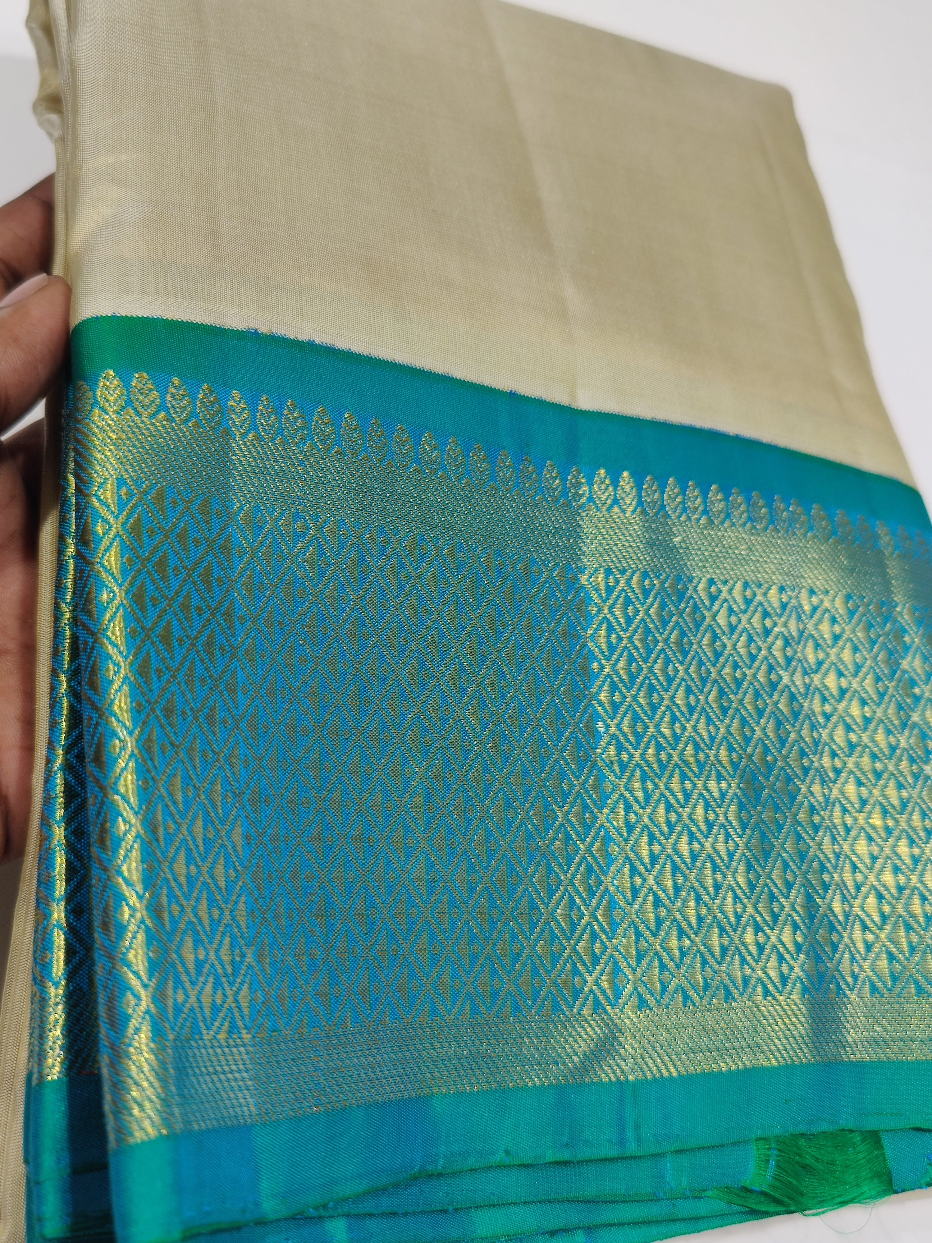 "Pure Cream Kanjivaram Silk Dhoti with Rama Green & Gold Zari Border + Shirt Piece – Wedding Collection"