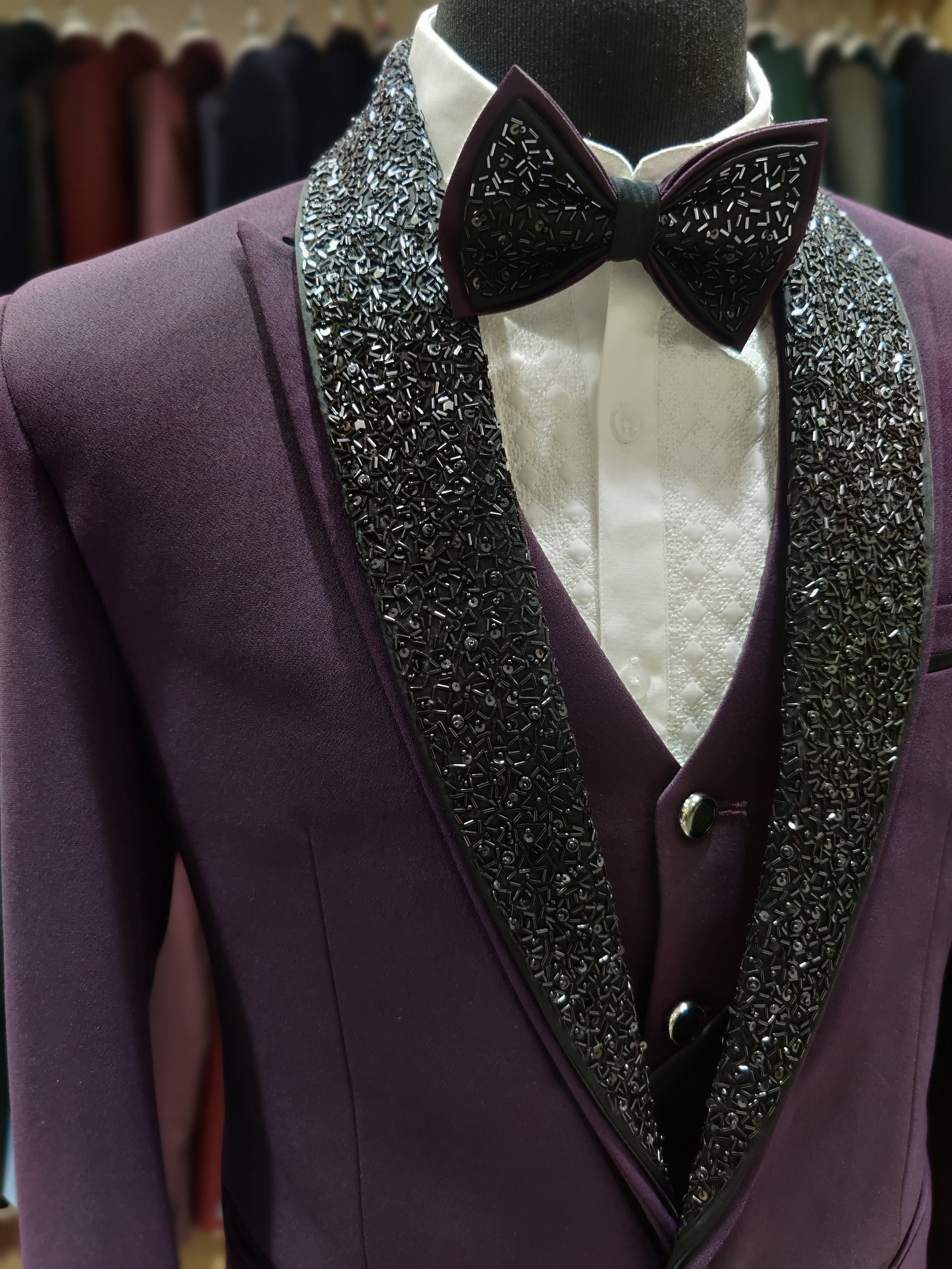 Regal Wine Wedding Suit with Black Accents & Stone Work