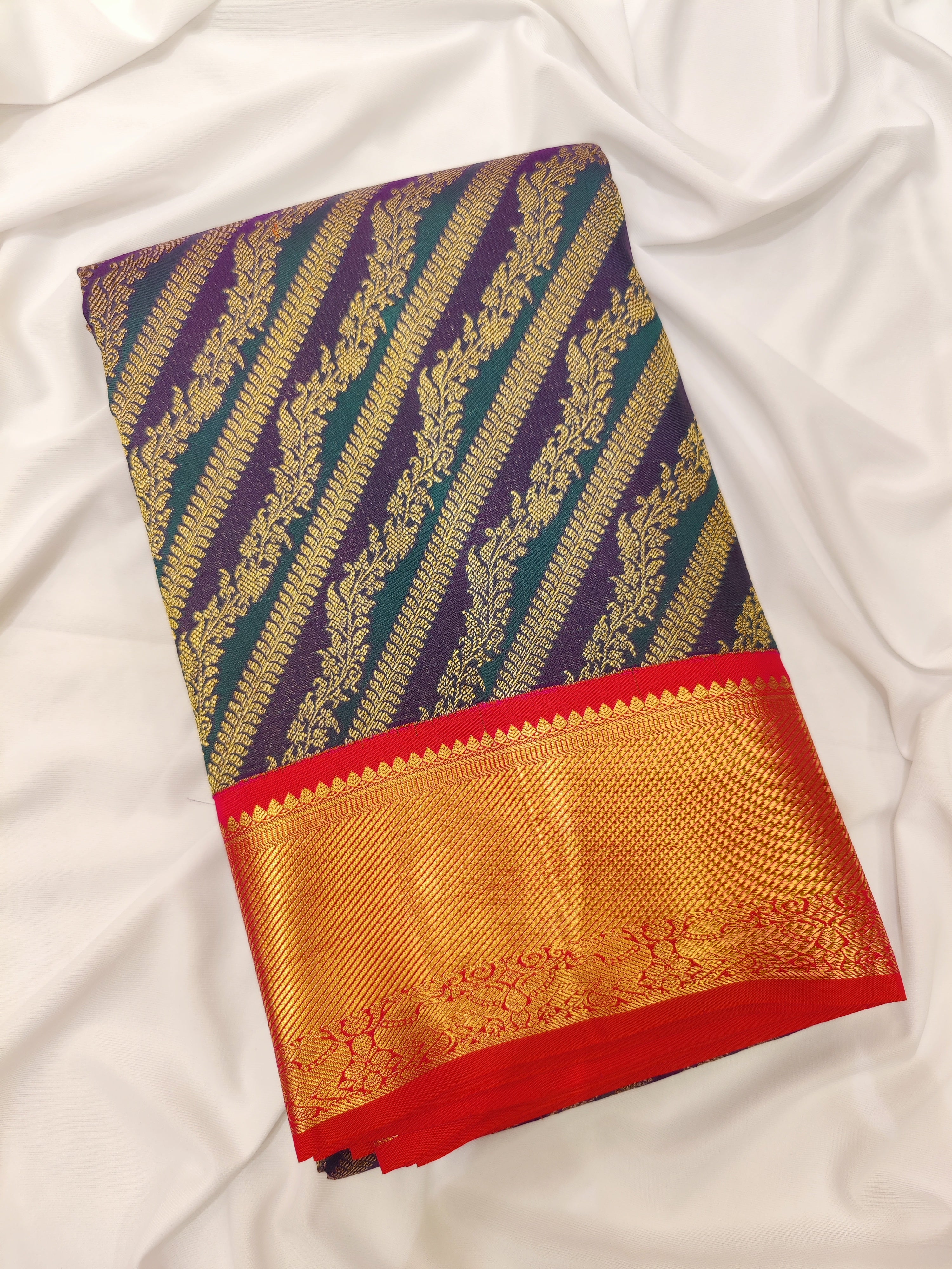 Peacock Blue Kanjivaram Silk Saree with Pink Zari Border – Pure Handloom Bridal Saree Online