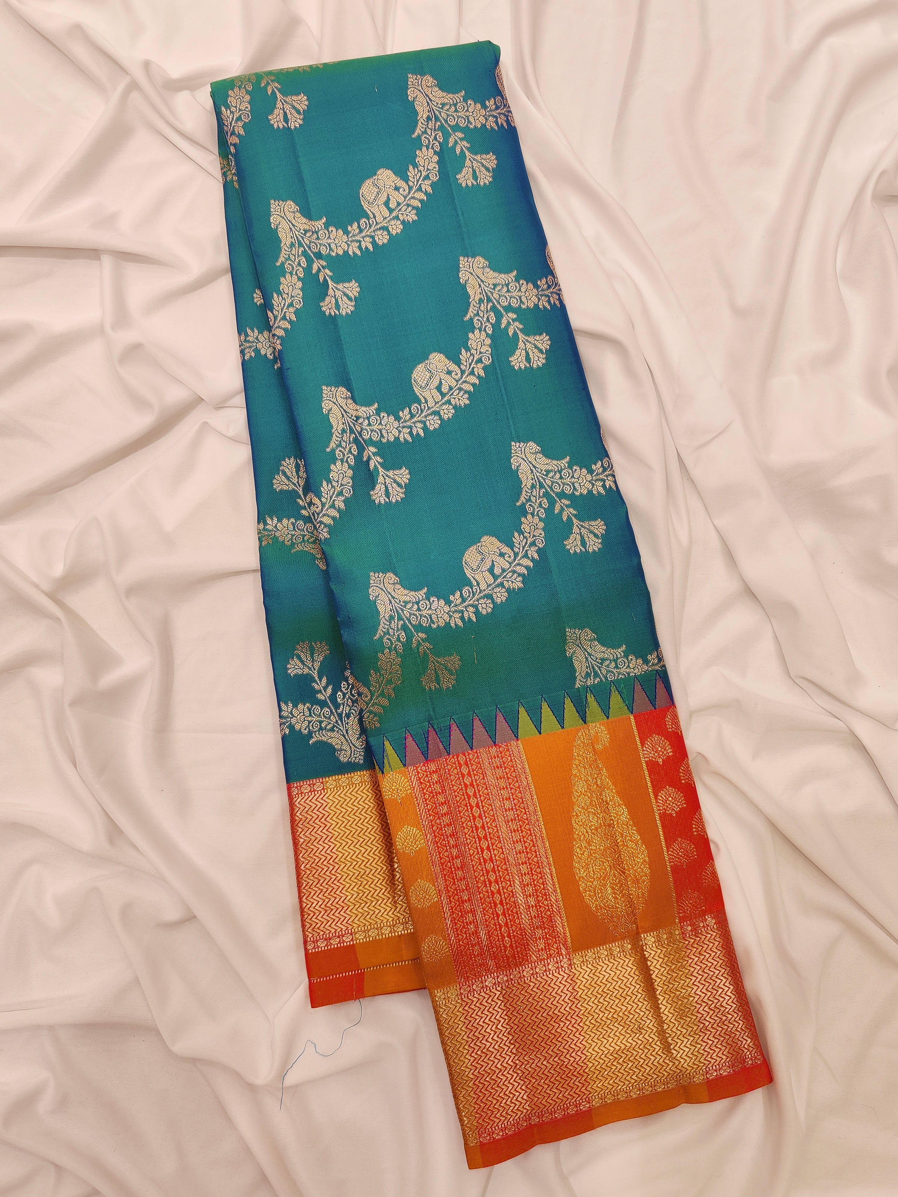 Double-Shade Peacock Blue Kanjivaram Silk Saree with Temple Designer Border – Traditional Bridal Silk Saree Online