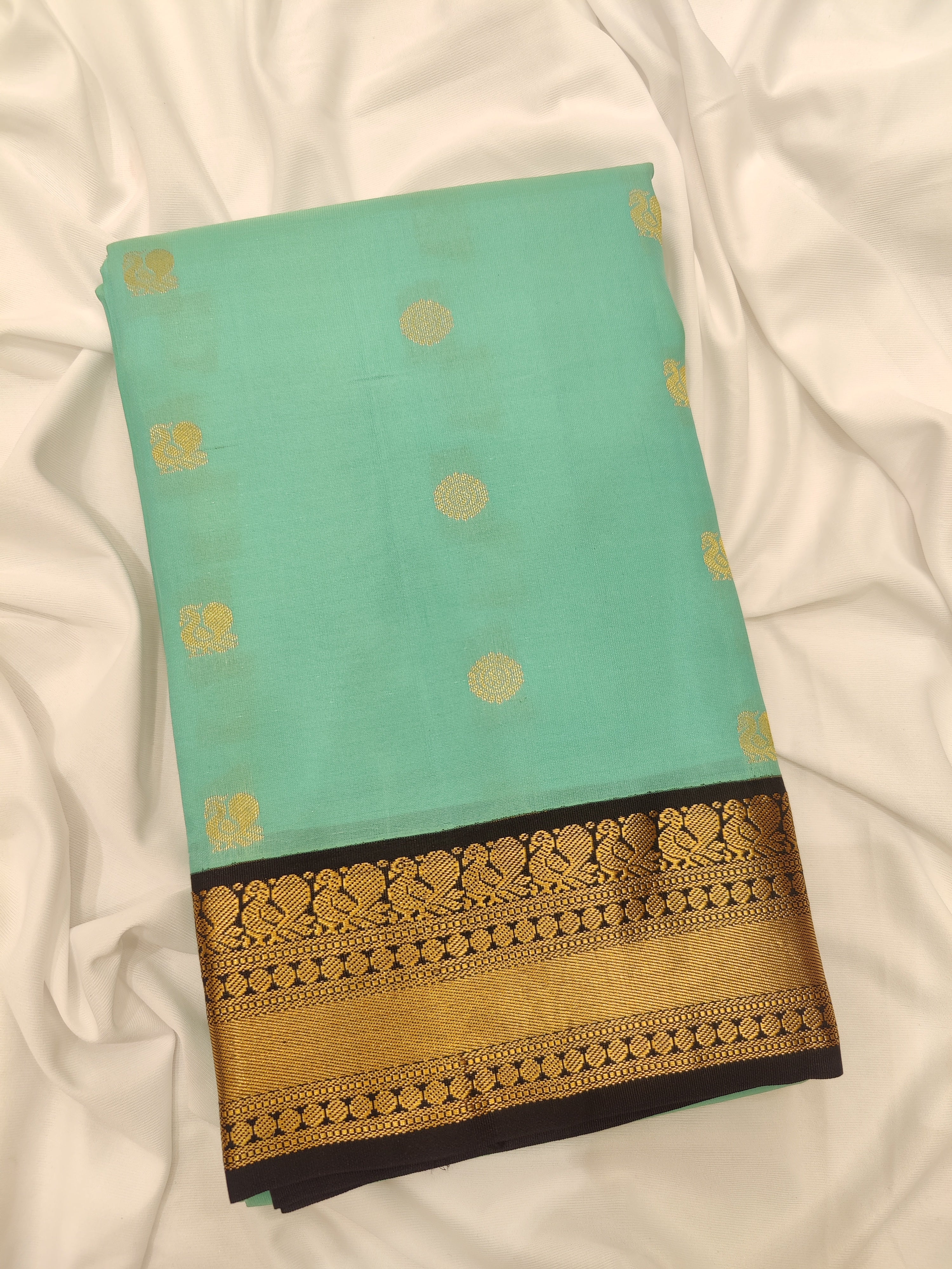 Sky Blue Kanjivaram Silk Saree with Black Peacock Zari Border – Elegant Handloom Saree for Weddings Online - New Sudarshan Silks`
