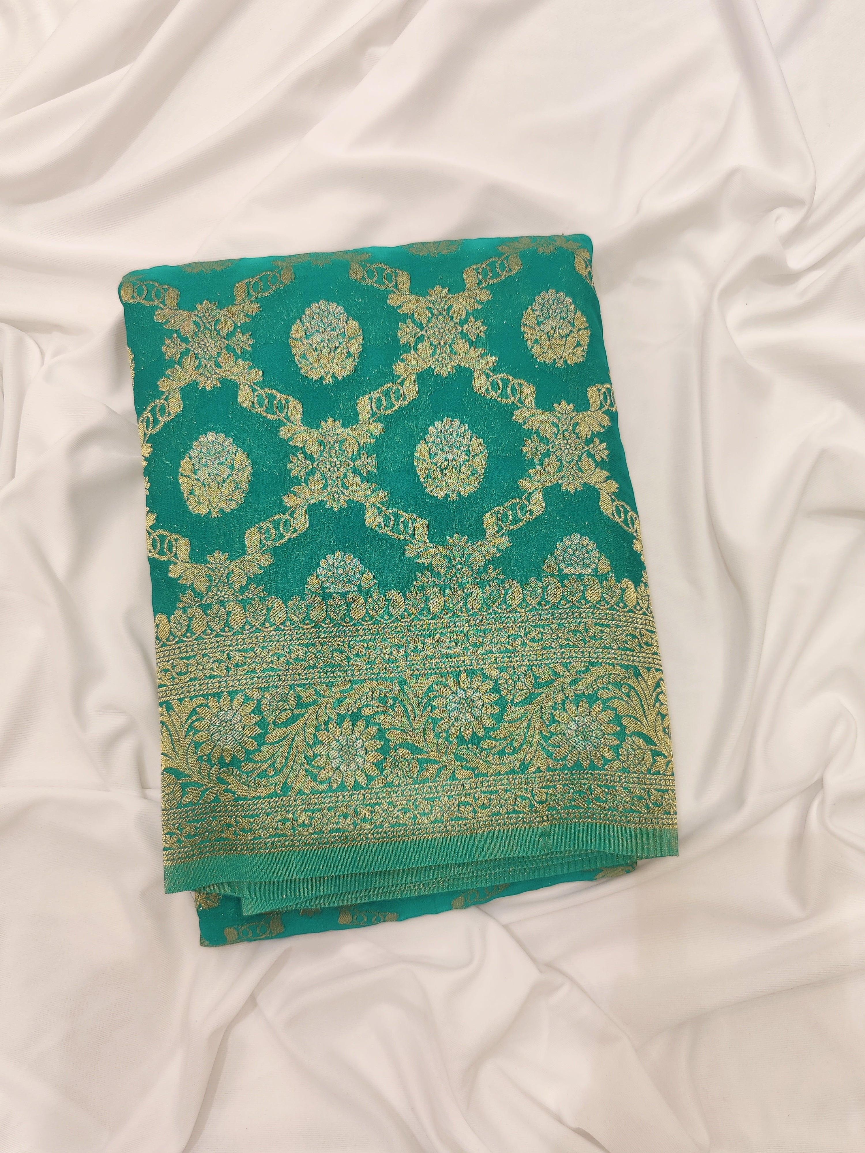 Rama Green Semi Georgette Silk Saree with Zari Border – Elegant Lightweight Saree for Festive Wear Online - New Sudarshan Silks`